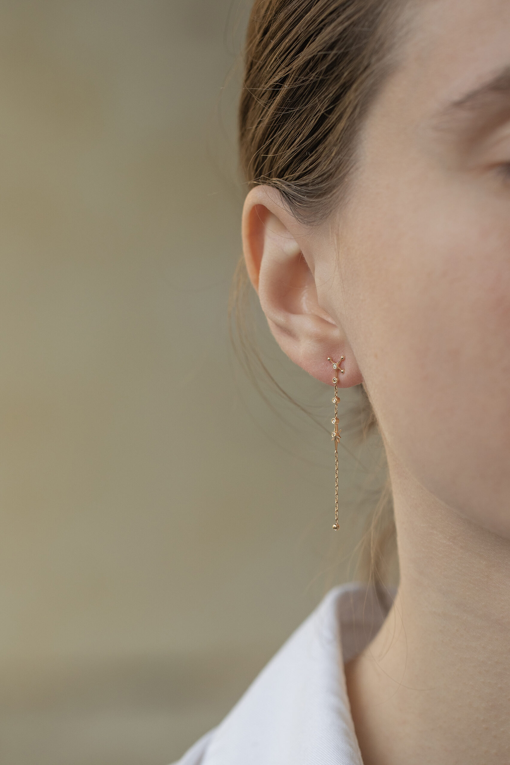 Yellow gold long chain earrings starburst diamond north star ball drops pair Celine Daoust