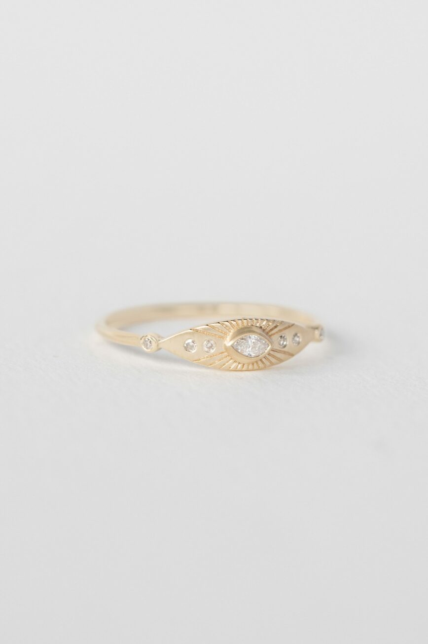 Yellow gold ring round diamond open sun ray eye engraved motif band Celine Daoust