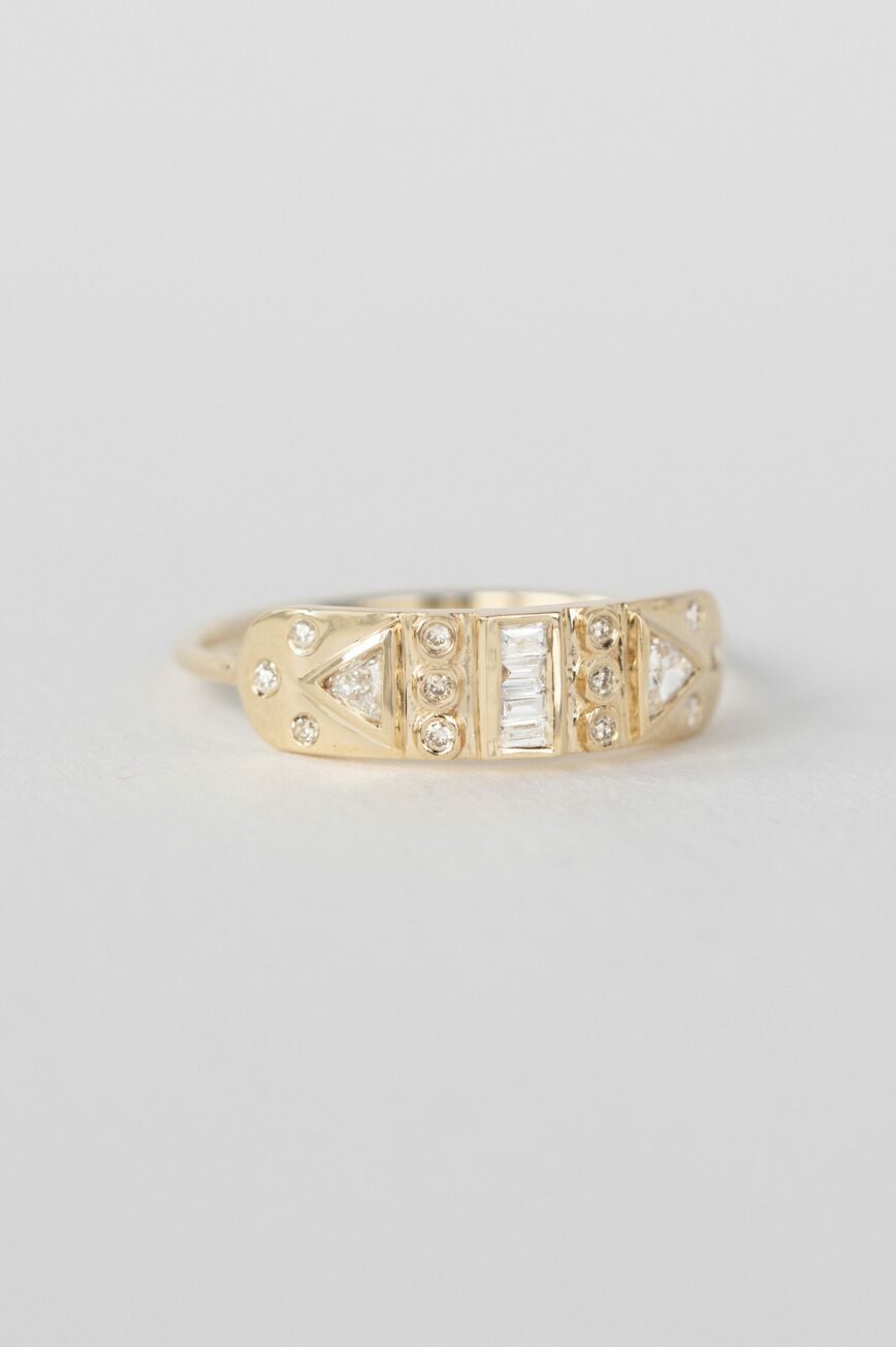 Yellow gold wide band ring baguette triangle diamond totem motifs Celine Daoust