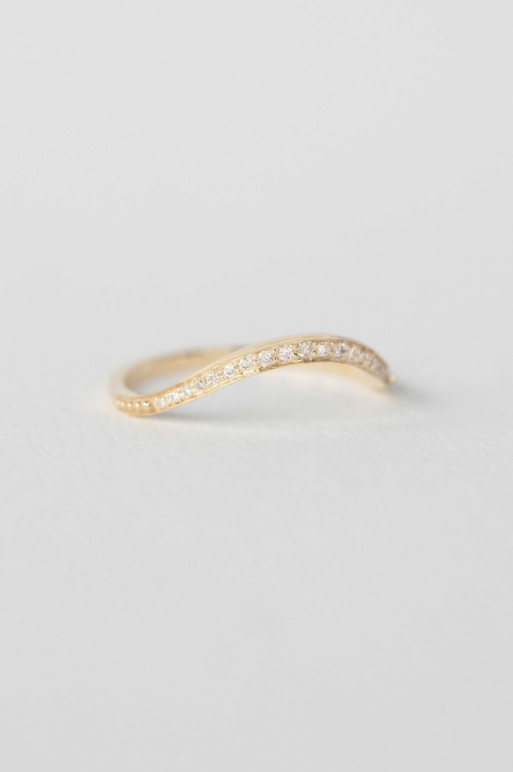 Yellow gold curved wave ring pavé diamond band Celine Daoust