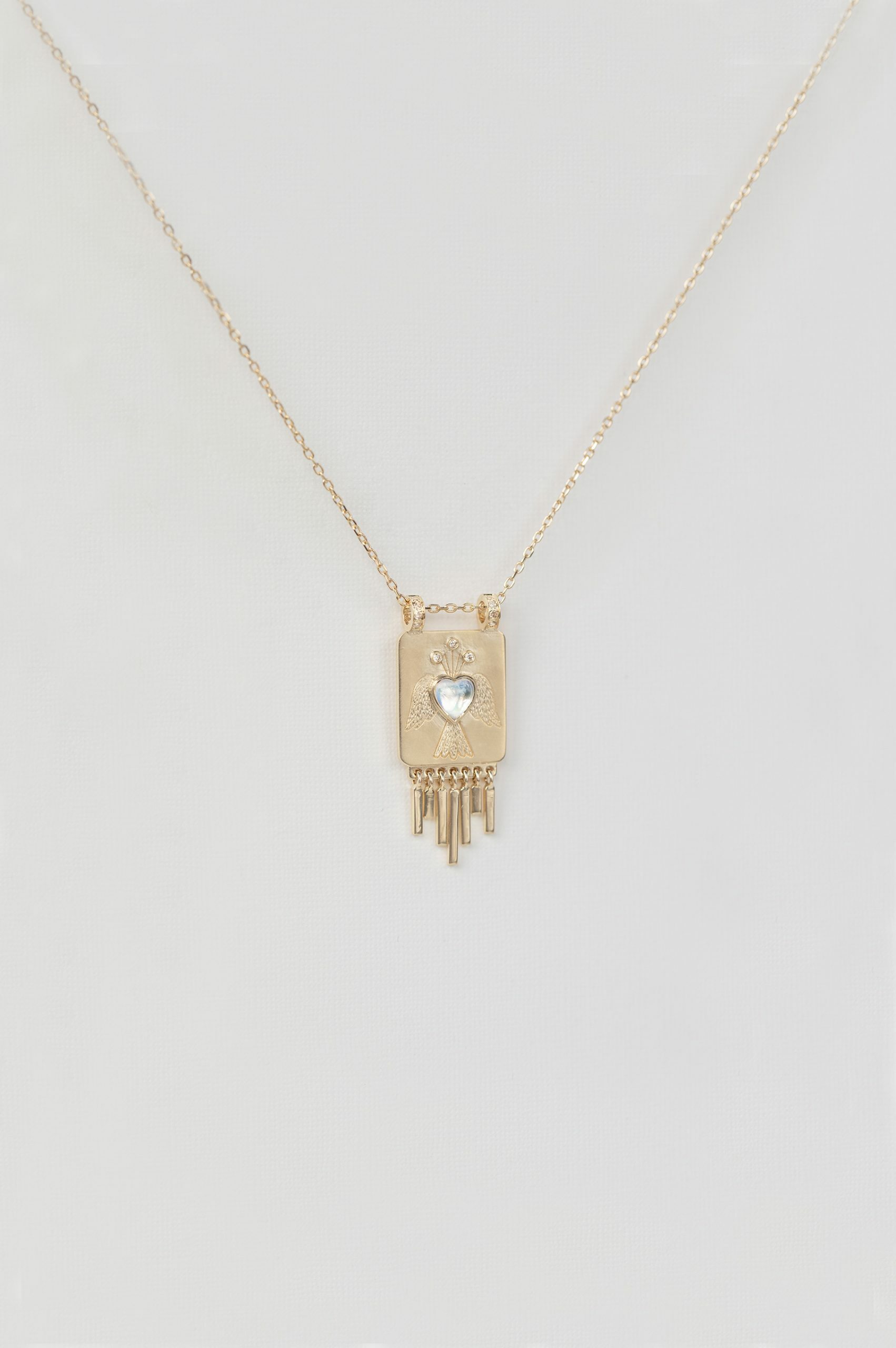 Yellow gold necklace rectangular solid plate pendant heart moonstone diamond fringe Celine Daoust