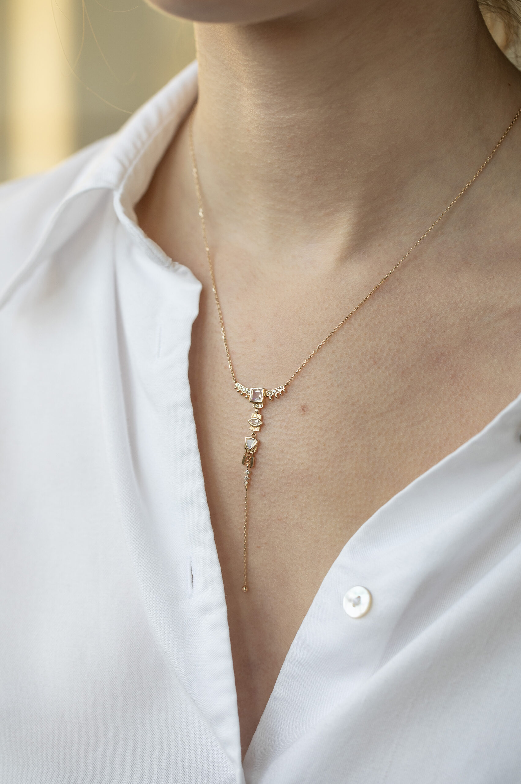 Yellow gold lariat necklace diamond totem charms moonstone drop chain Celine Daoust