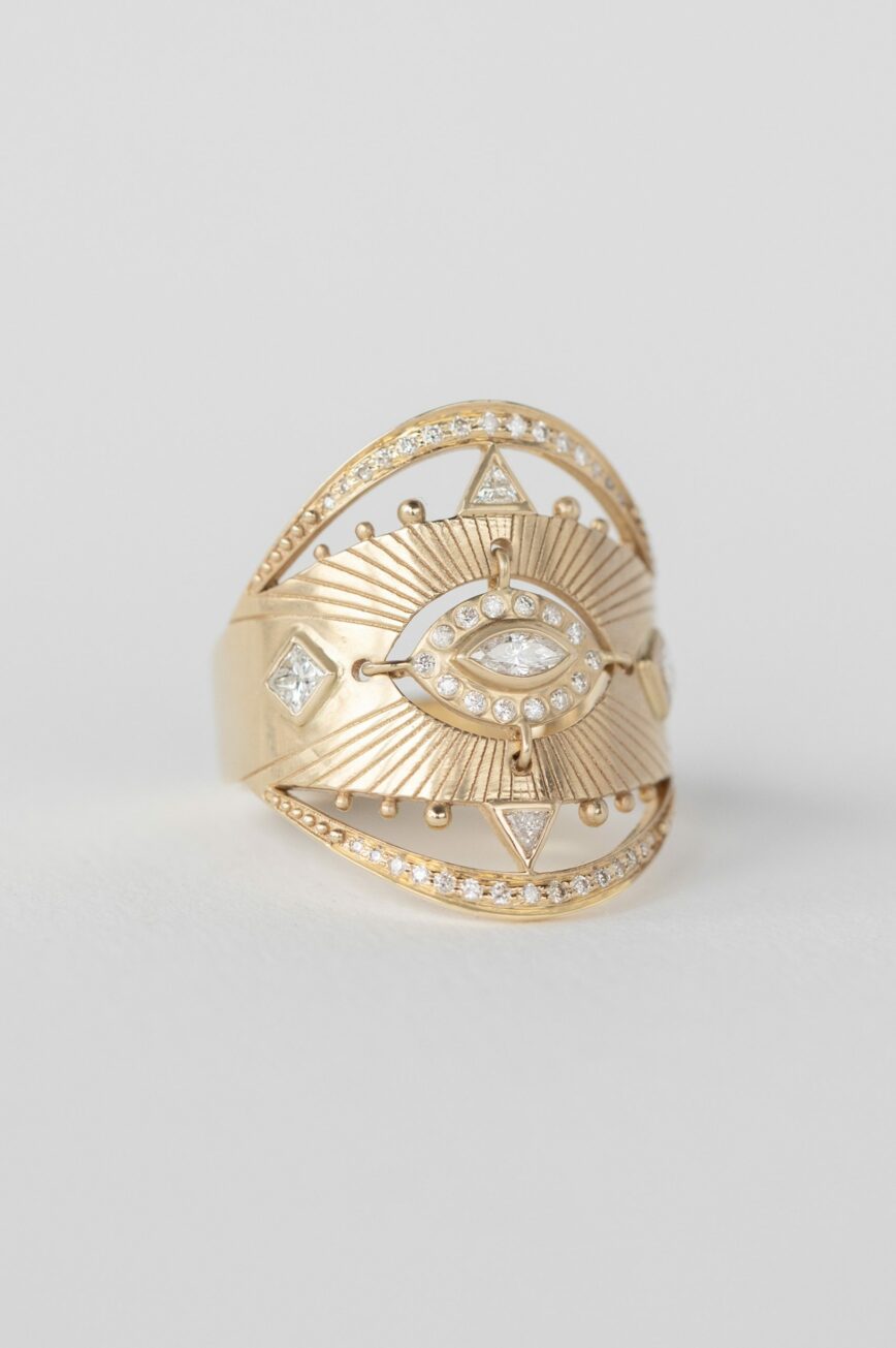 Yellow gold wide ring marquise diamond sun ray open eye pavé diamond frame Celine Daoust