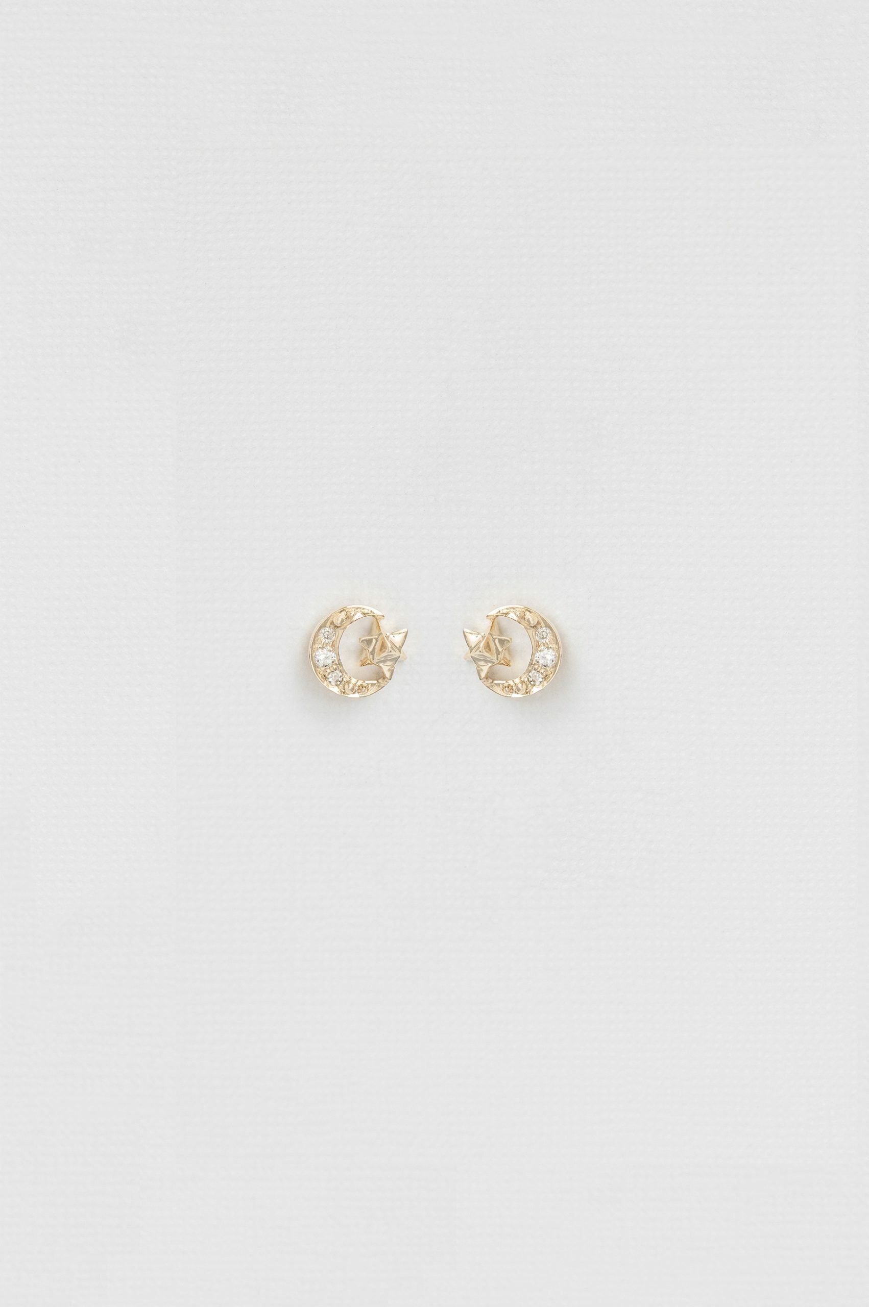 Yellow gold stud earrings moon crescent diamond merkabah motif pair Celine Daoust