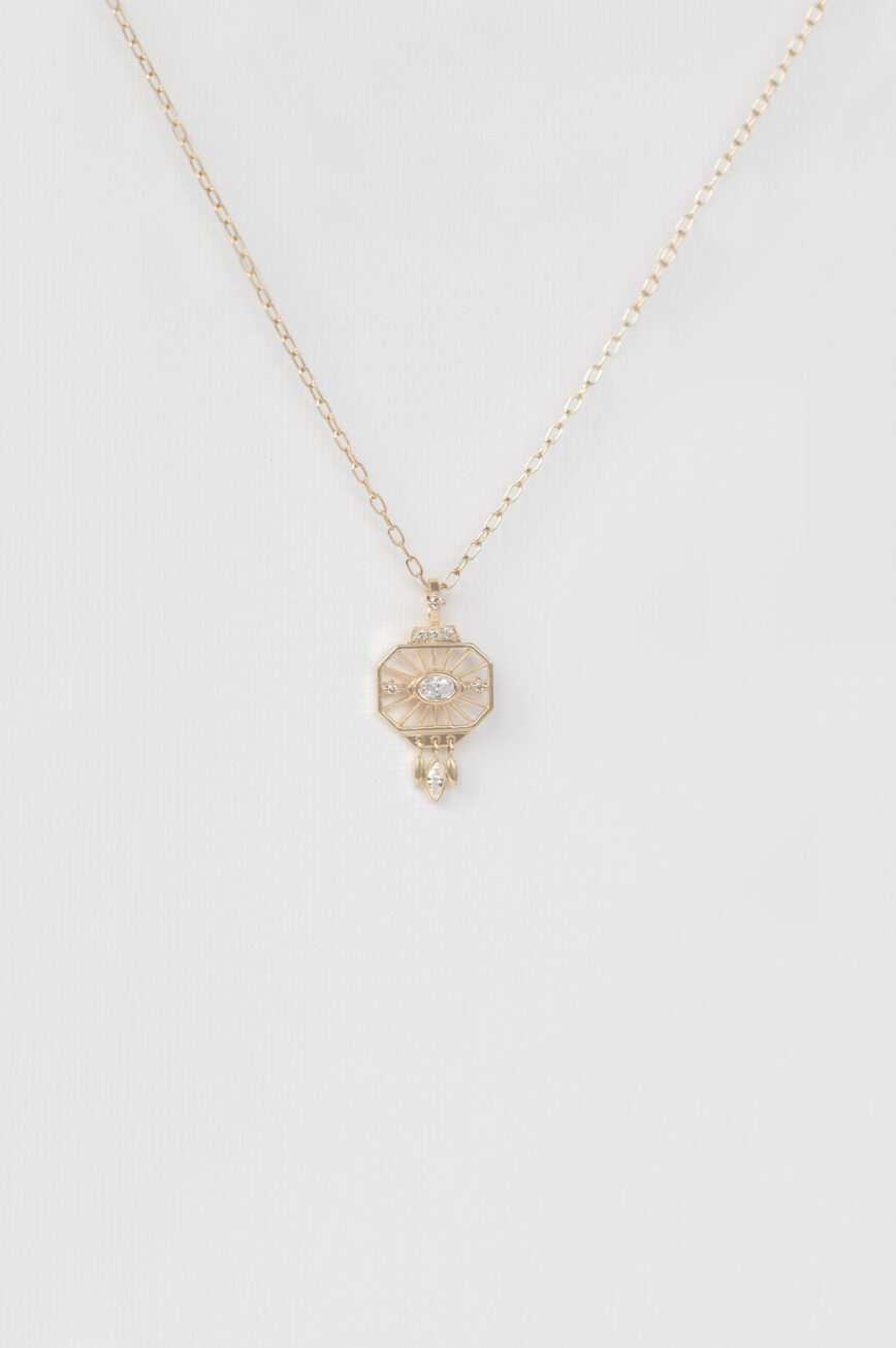 Gold necklace octagonal engraved pendant open eye diamond pearl drops Céline Daoust