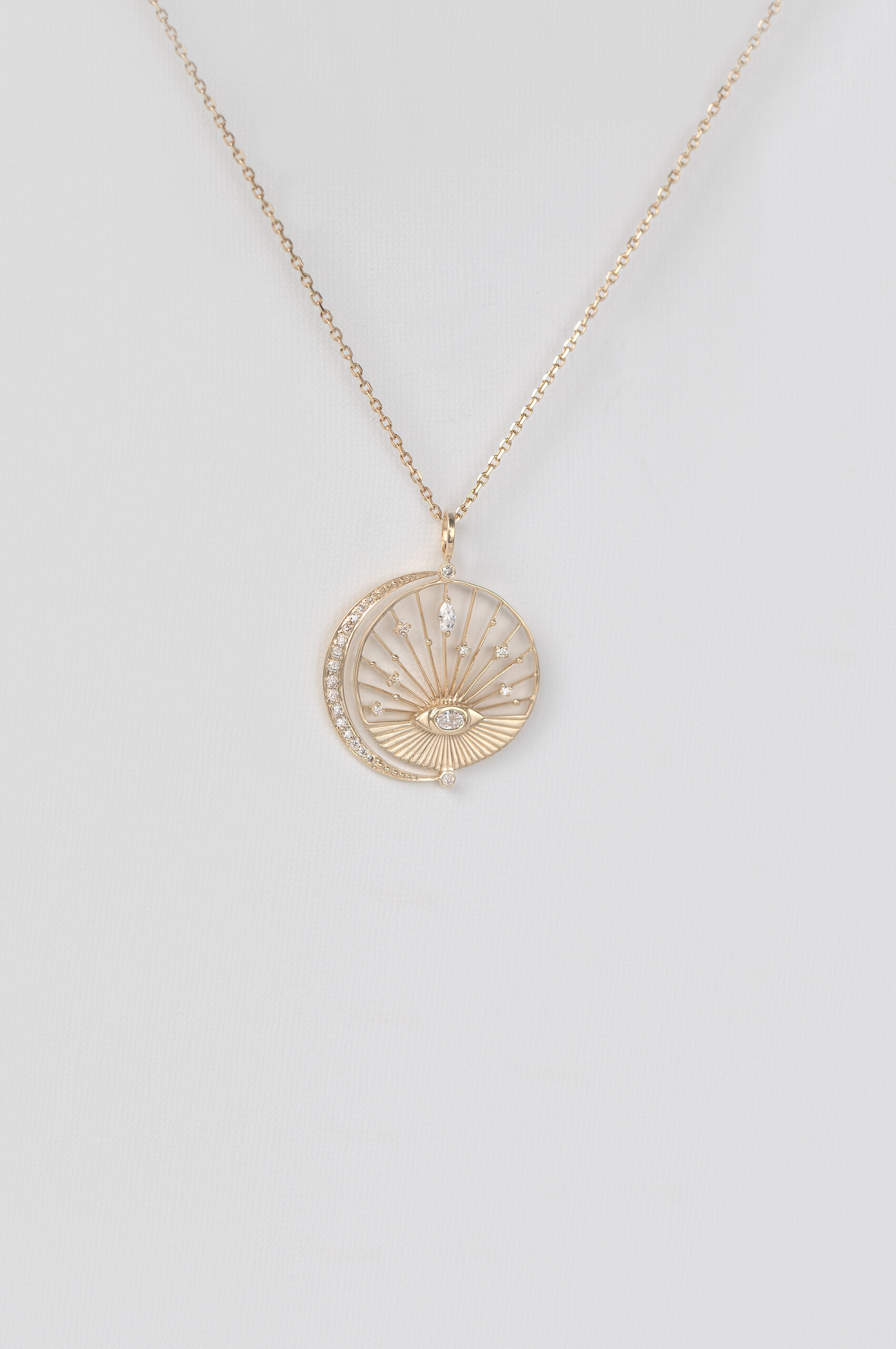 Yellow gold necklace round open disc pendant eye diamond moon crescent motif Celine Daoust