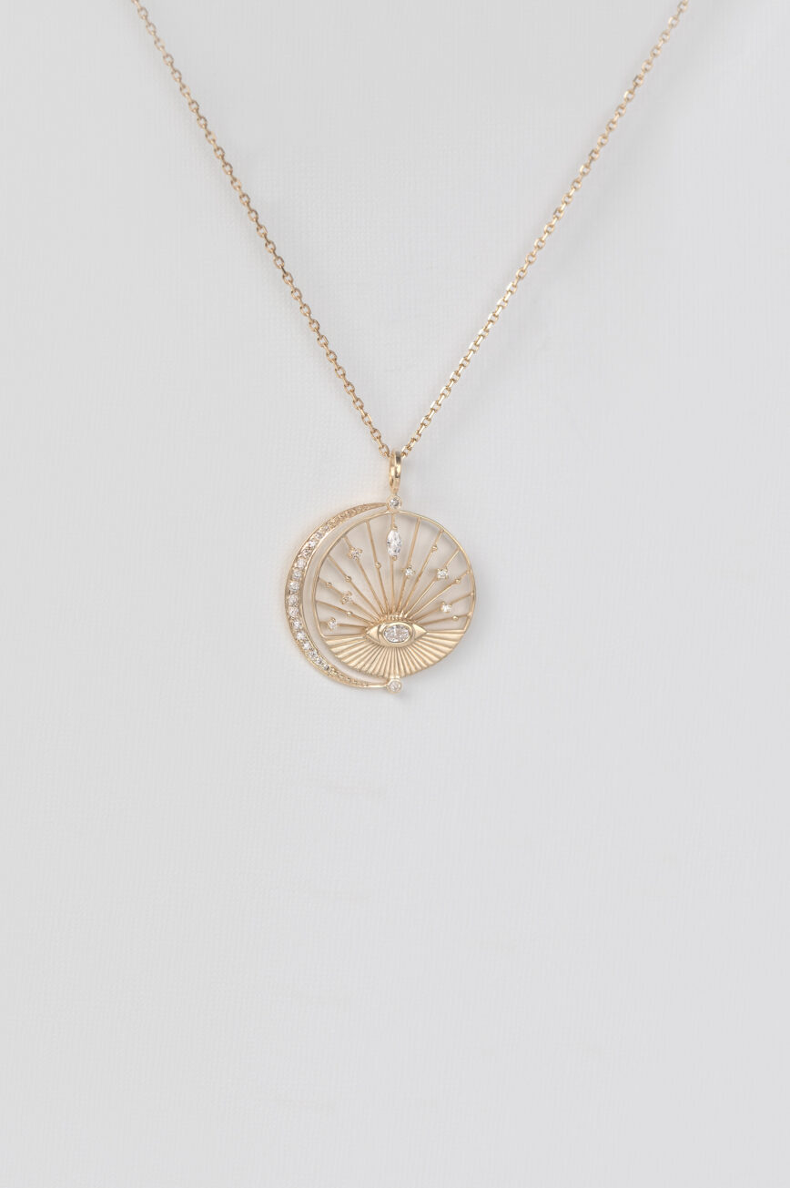 Yellow gold necklace round open disc pendant eye diamond moon crescent motif Celine Daoust