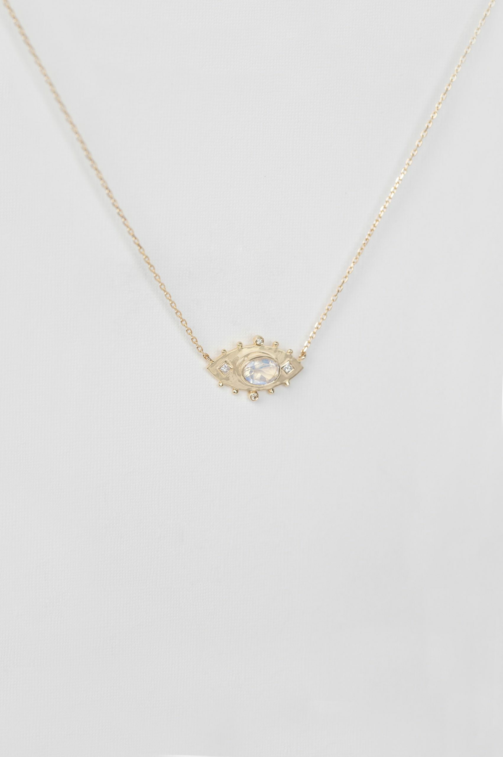 Yellow gold necklace oval moonstone open eye diamond pendant chain Celine Daoust