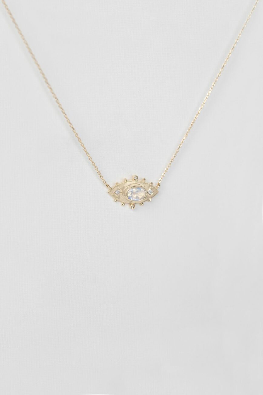 Yellow gold necklace oval moonstone open eye diamond pendant chain Celine Daoust