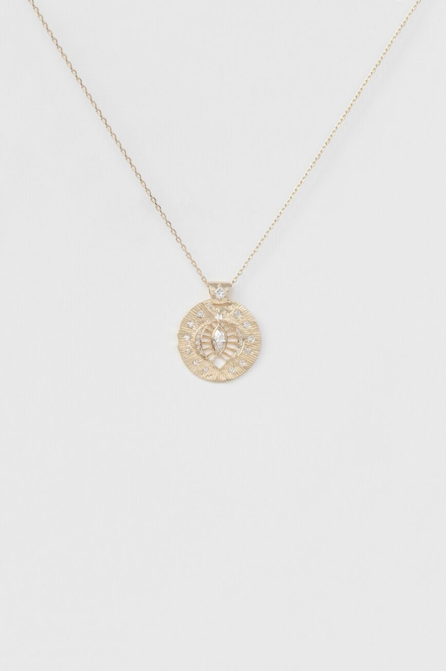 Yellow gold necklace round engraved disc pendant marquise diamond eye motif Celine Daoust