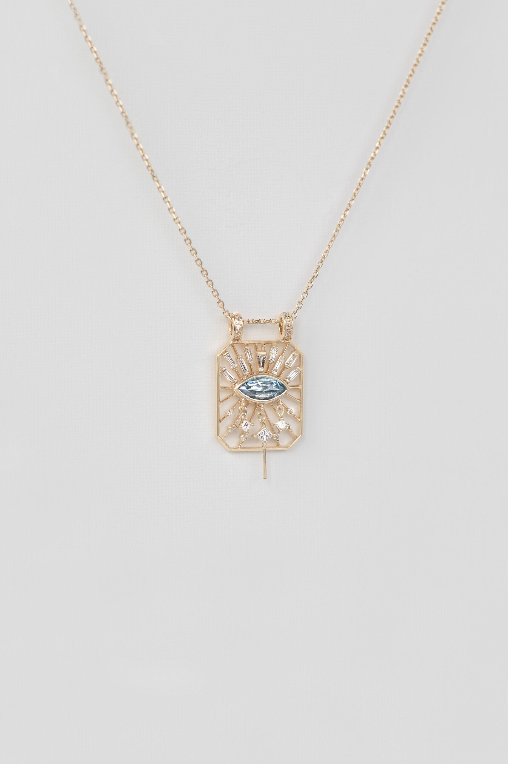 Yellow gold necklace open rectangle pendant marquise aquamarine eye motif diamond accents Celine Daoust