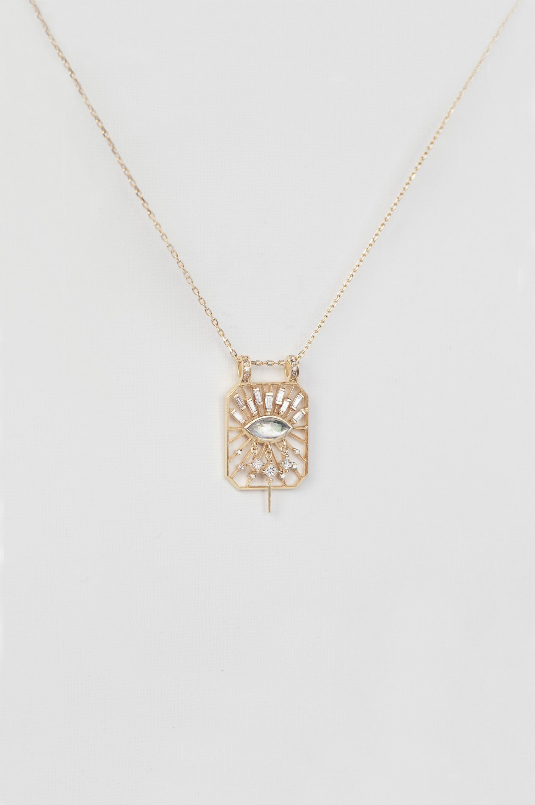 Yellow gold necklace open rectangle pendant marquise moonstone eye motif diamond accents Celine Daoust