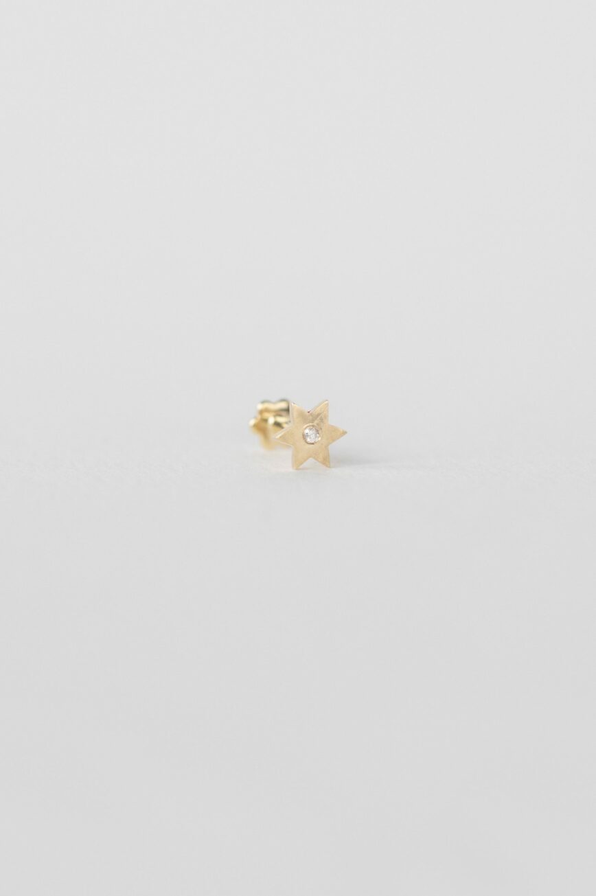 Gold flat back piercing star-shaped diamond stud Celine Daoust