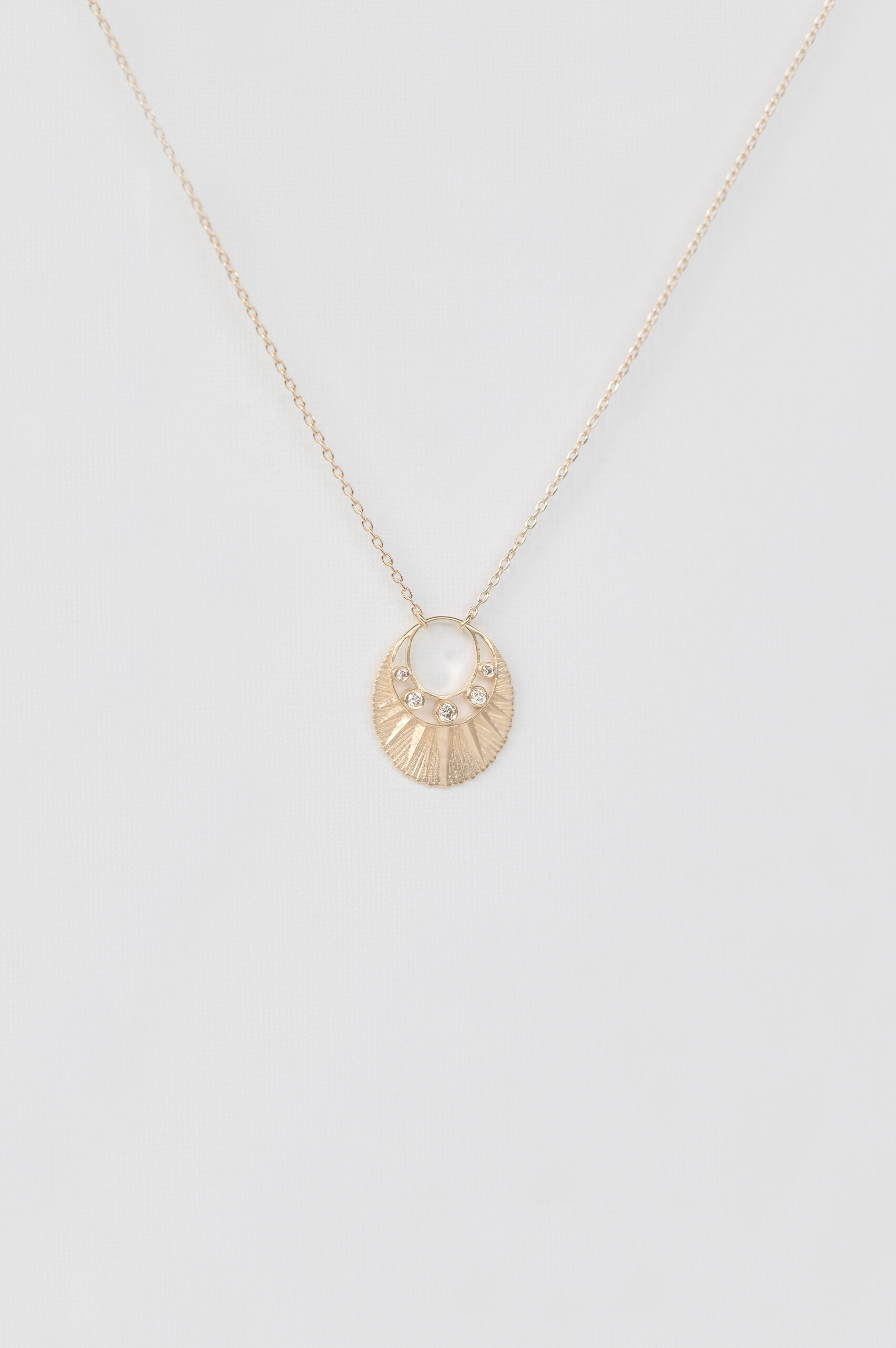 Gold necklace crescent moon pendant five diamonds engraved Céline Daoust