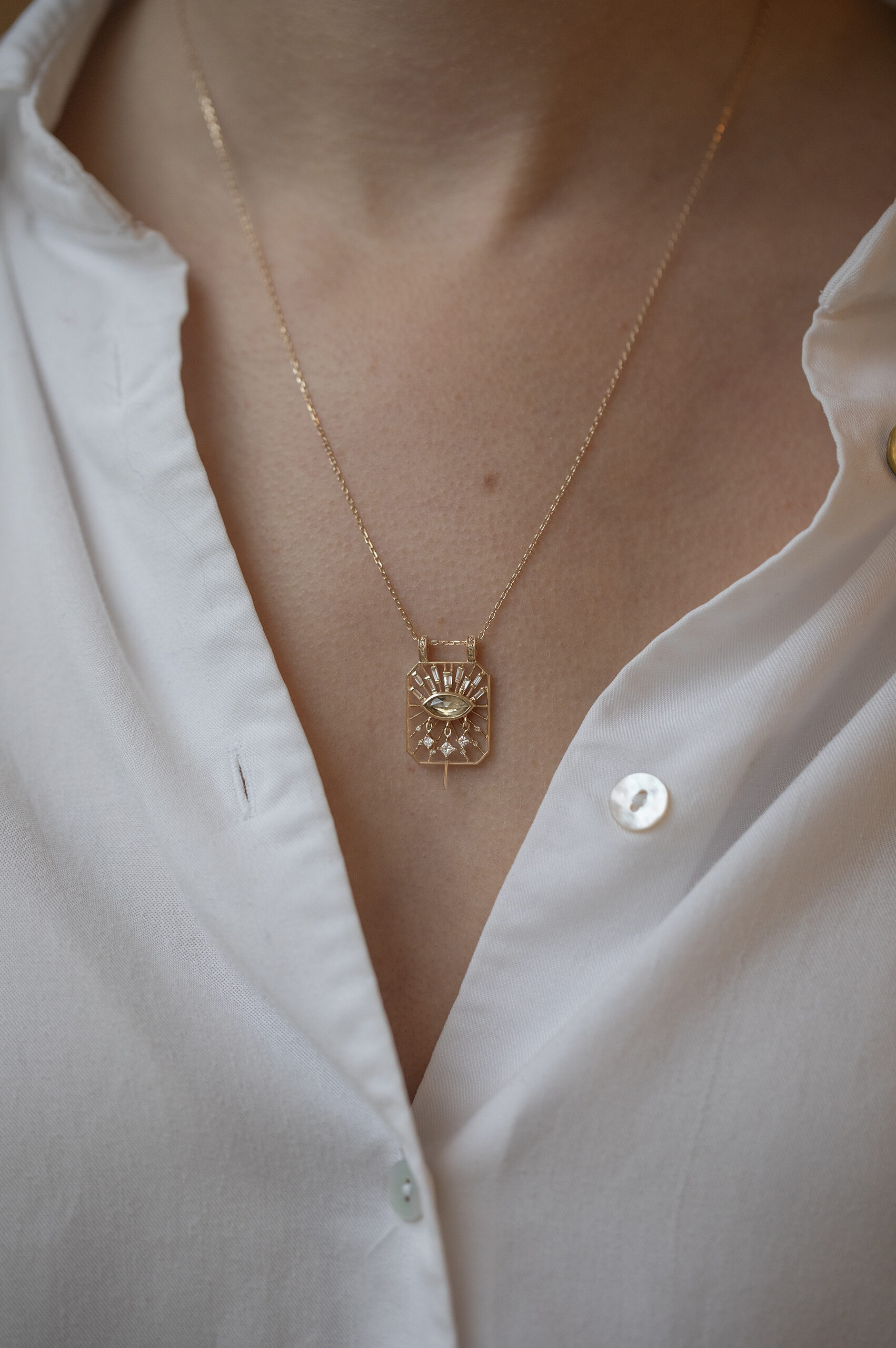 Yellow gold necklace open rectangle pendant marquise sepia tourmaline eye diamond motif Celine Daoust