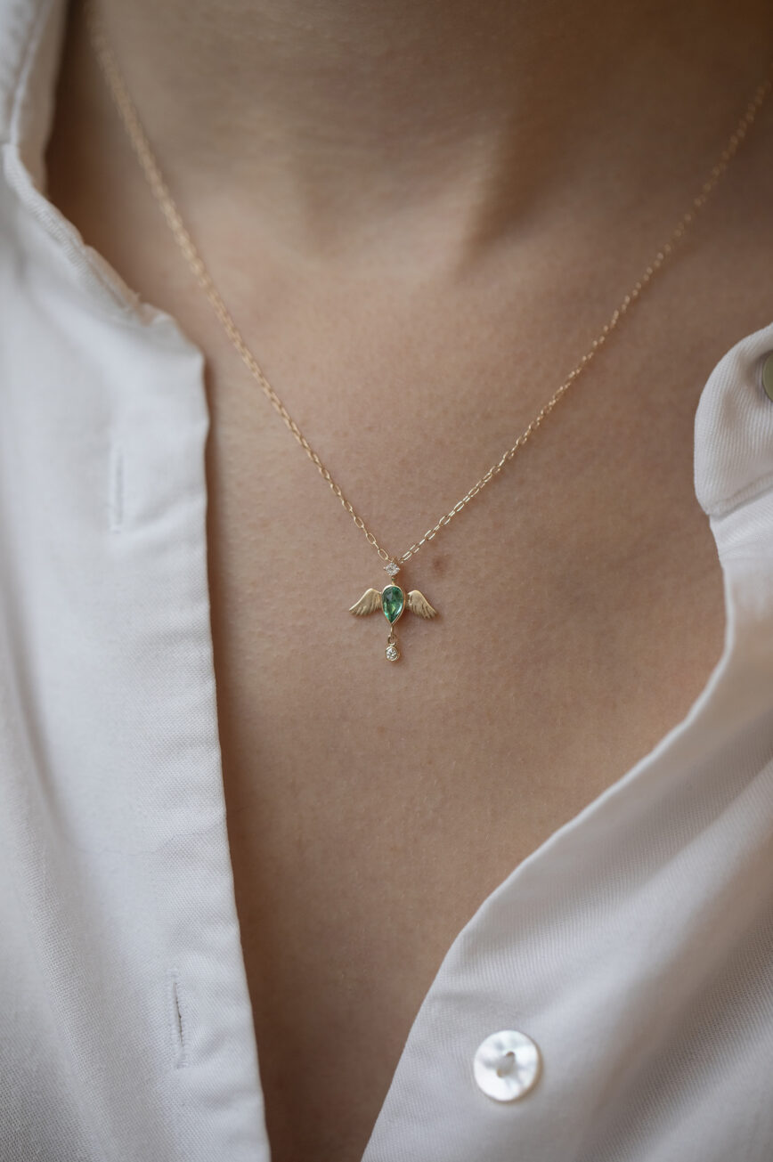 Yellow gold necklace pear emerald angel wings diamond pendant Celine Daoust