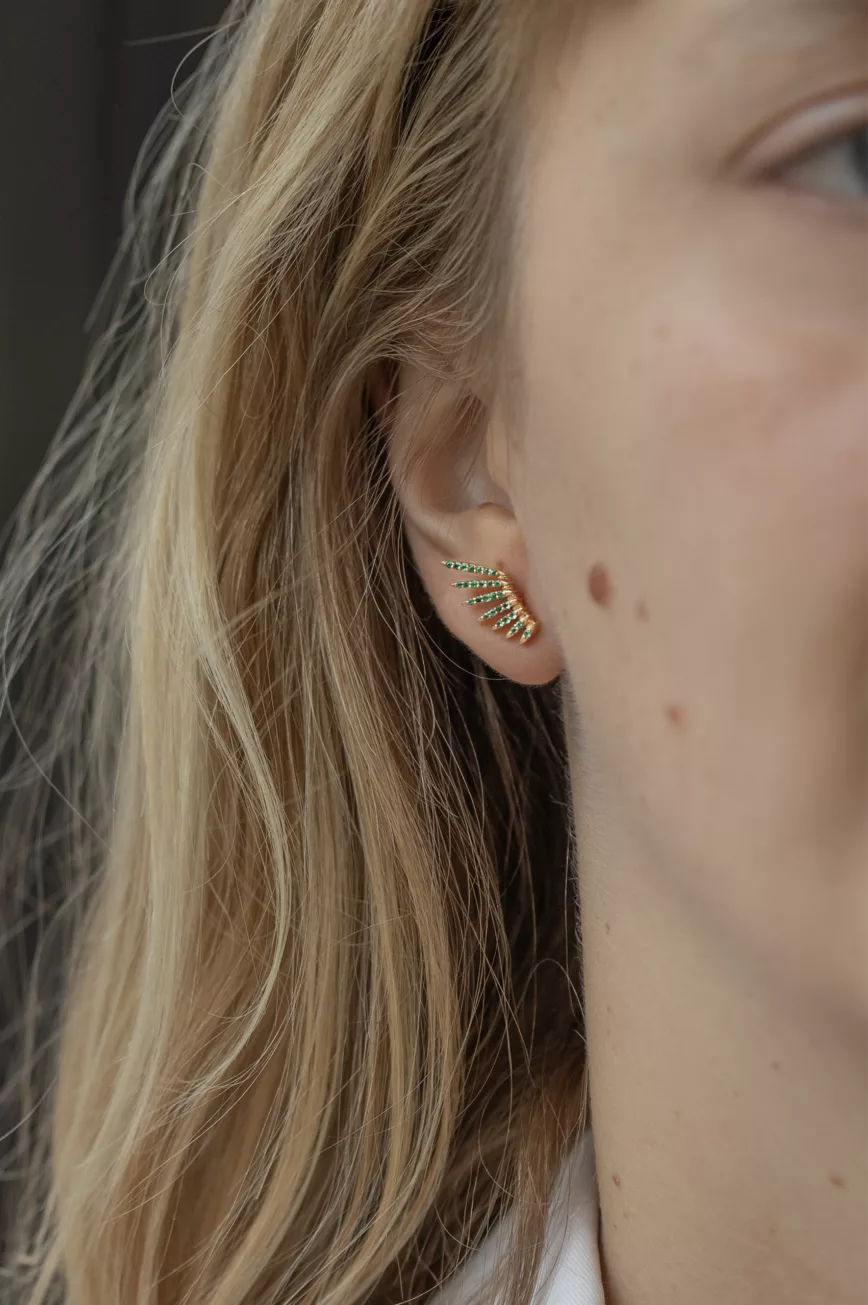 Yellow gold stud earrings sculpted wing motif pavé emerald pair Celine Daoust