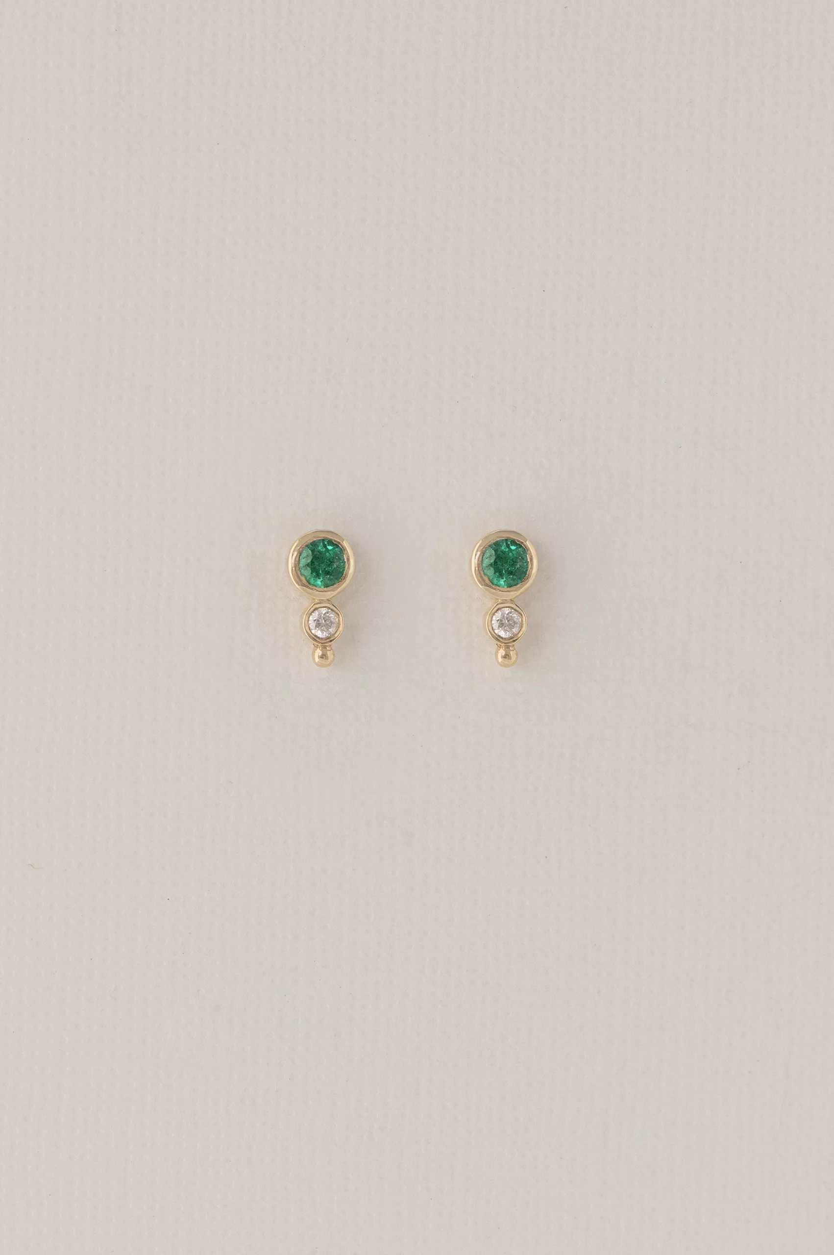 Yellow gold stud earrings round emerald diamond accent pair Celine Daoust