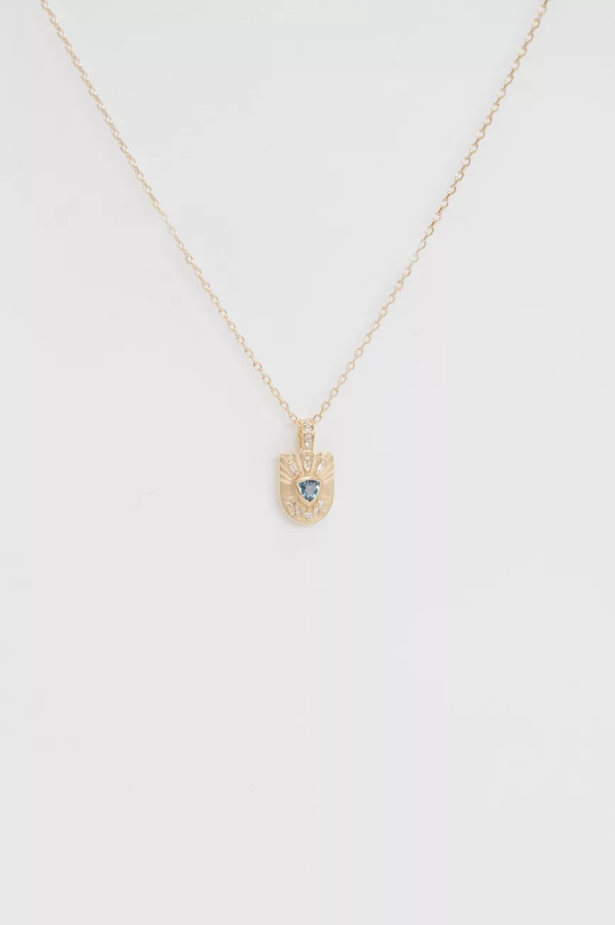 Yellow gold necklace engraved shield pendant trillion aquamarine diamond sun motif Celine Daoust