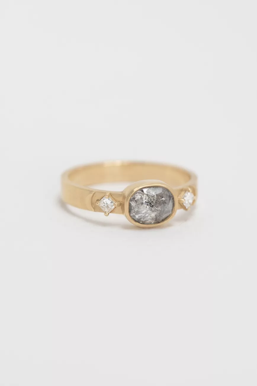 Yellow gold signet ring oval dark grey diamond square diamond side accents Celine Daoust