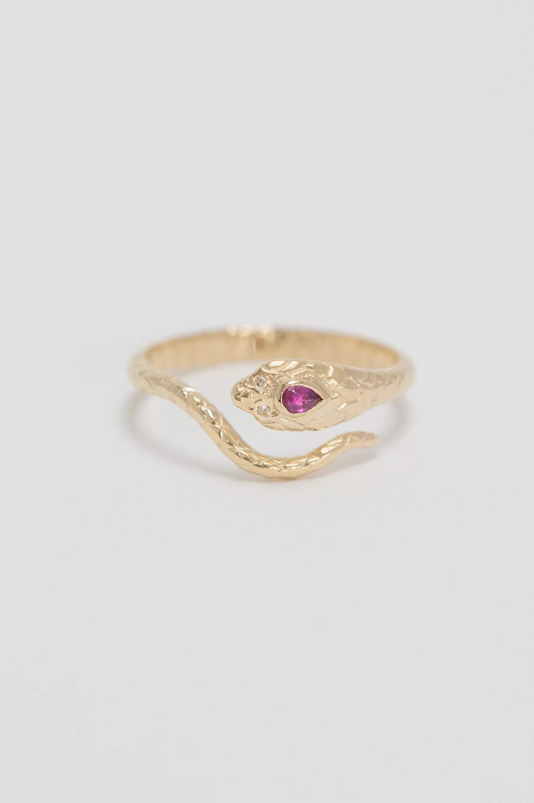 Yellow gold ring sculpted cobra motif pear ruby diamond accent Celine Daoust