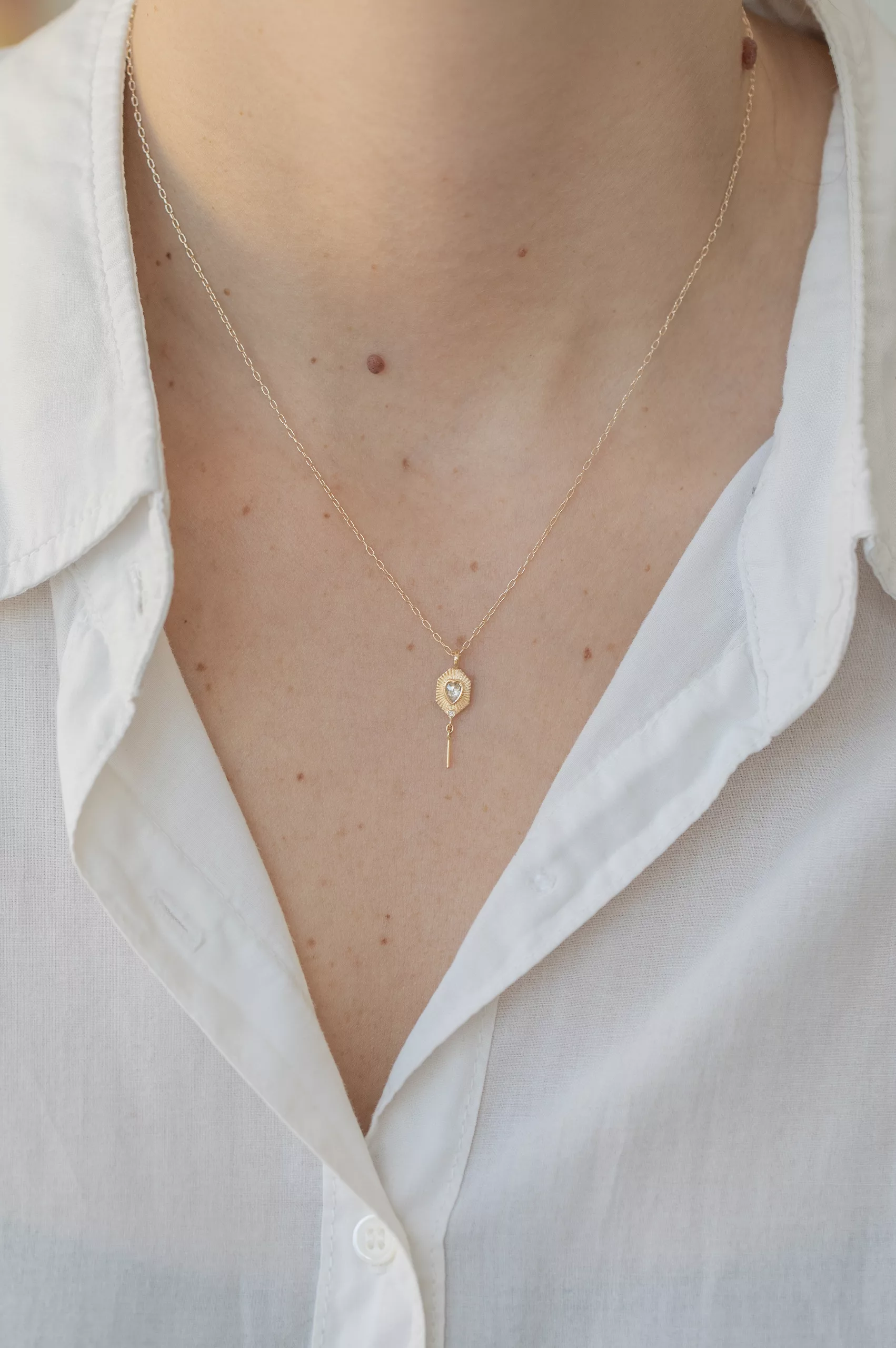 Yellow gold necklace small gold plate pendant champagne diamond heart motif spike drop Celine Daoust