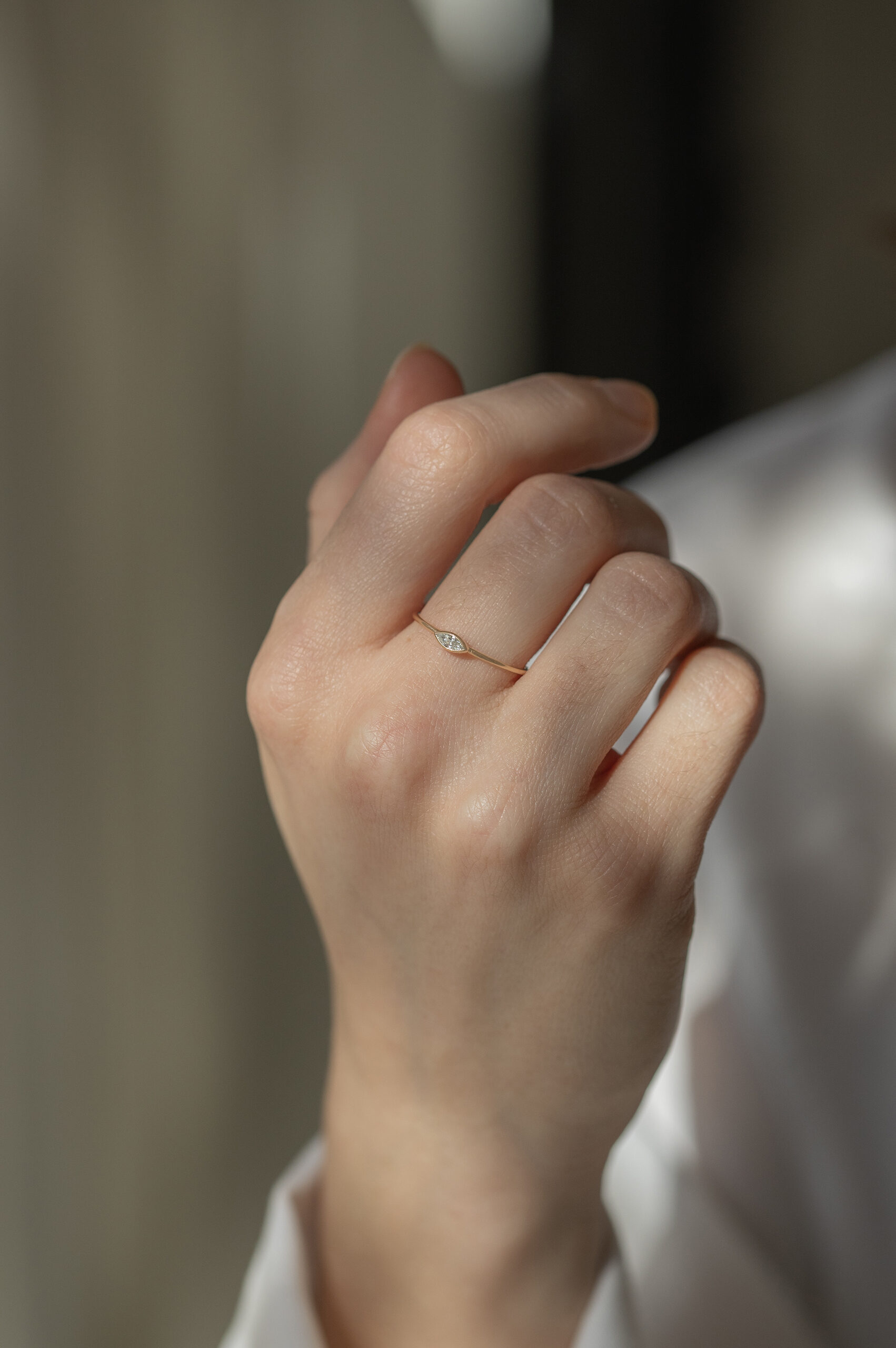 Yellow gold ring single marquise diamond open bezel slim band Celine Daoust