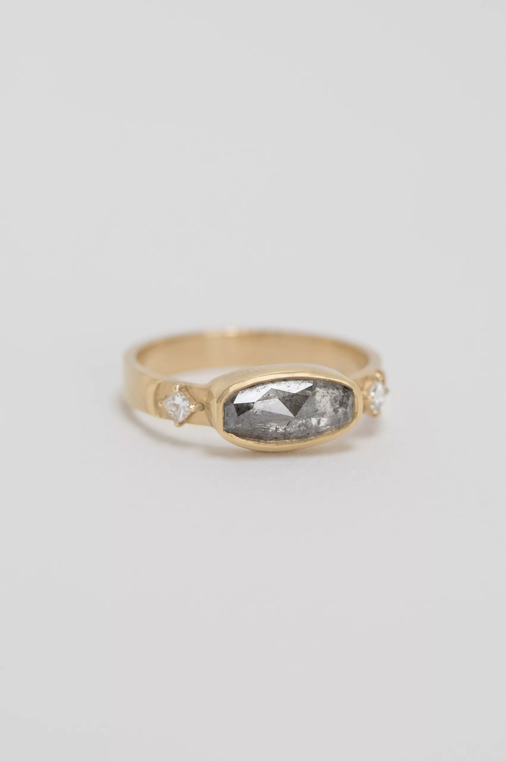 Yellow gold ring large oval grey diamond square diamond side accents Celine Daoust