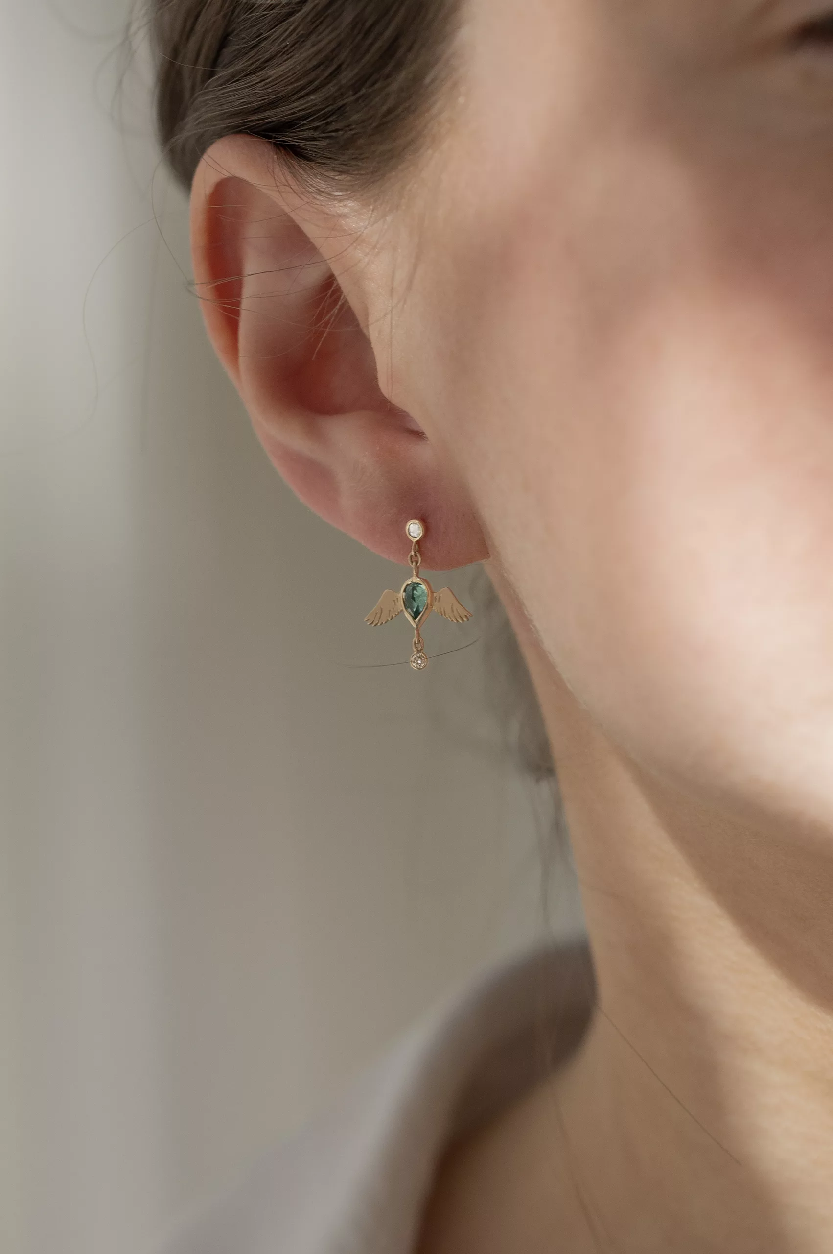 Gold single earring dark blue pear tourmaline bird motif diamond Céline Daoust