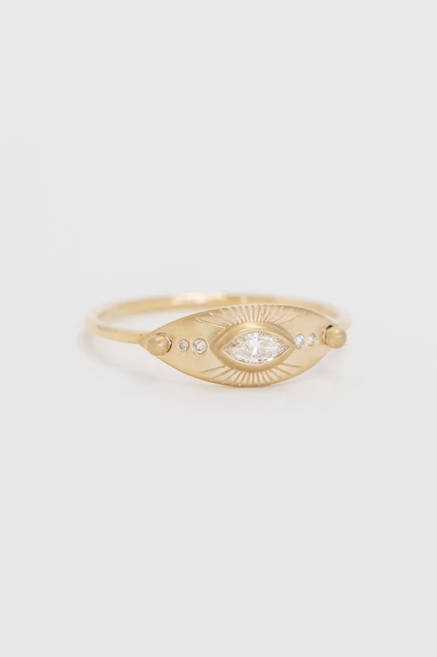 Gold ring large eye motif marquise diamond engraved sun rays Celine Daoust