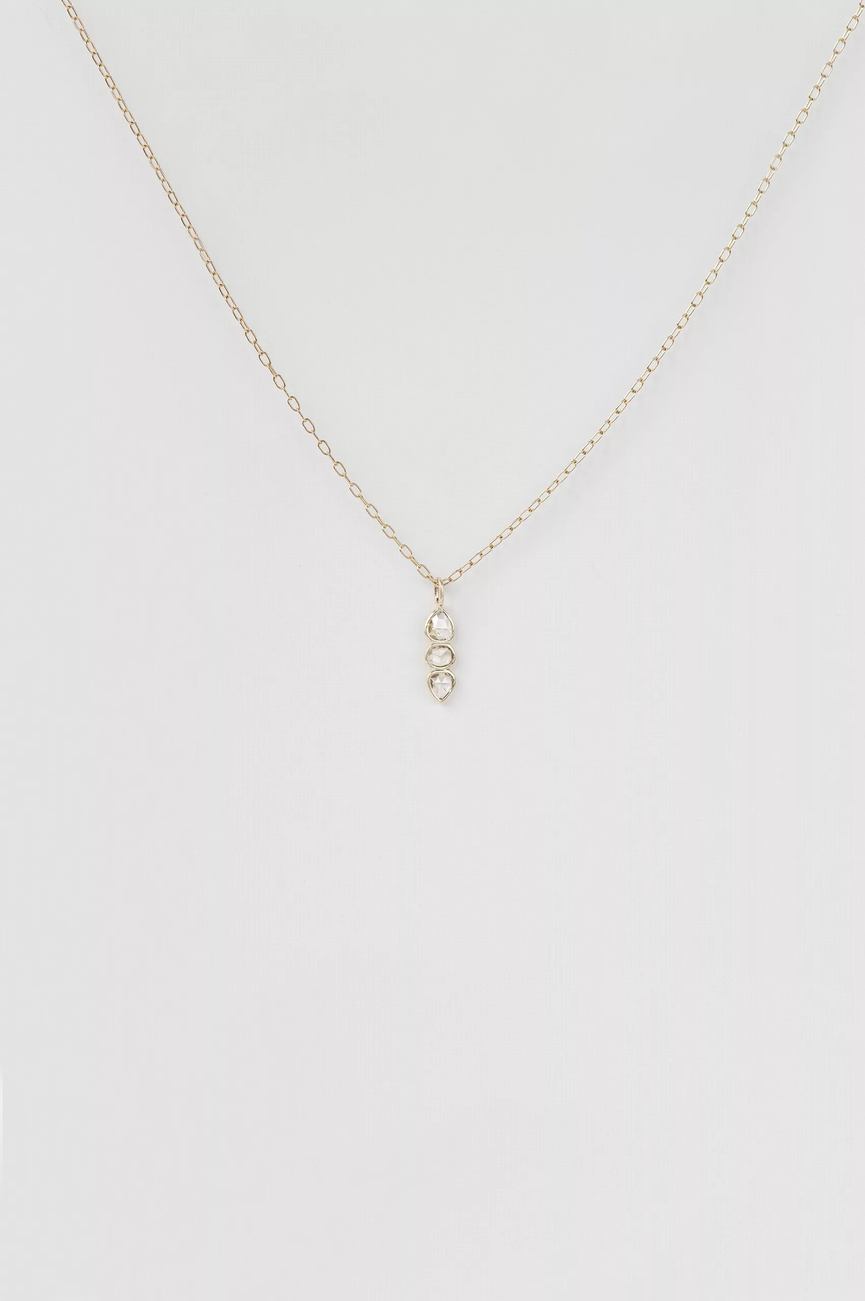 Yellow gold necklace three rosecut diamonds linear pendant delicate chain Celine Daoust