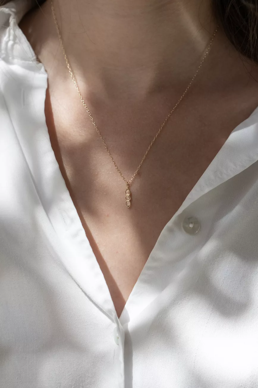 Yellow gold necklace three rosecut diamonds linear pendant delicate chain Celine Daoust