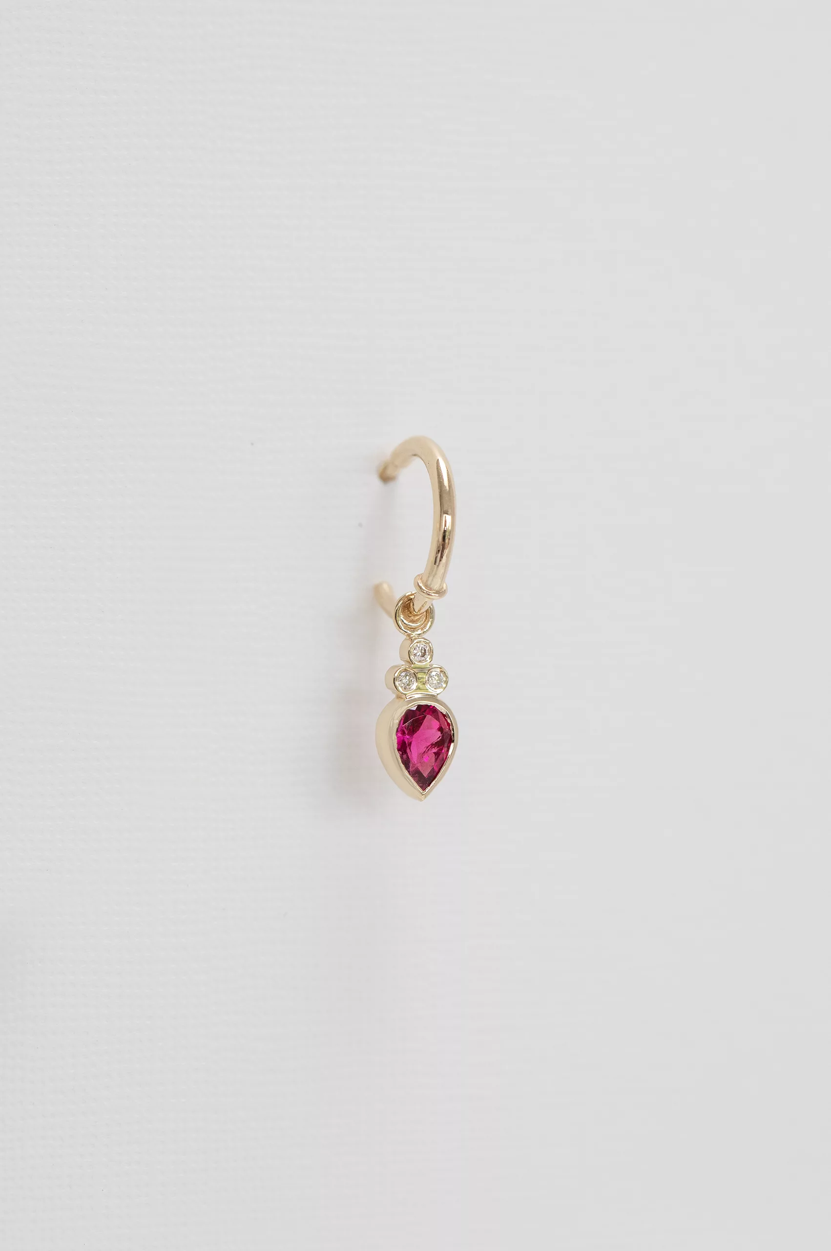 Yellow gold single hoop earring pear dark pink tourmaline diamond accent drop Celine Daoust