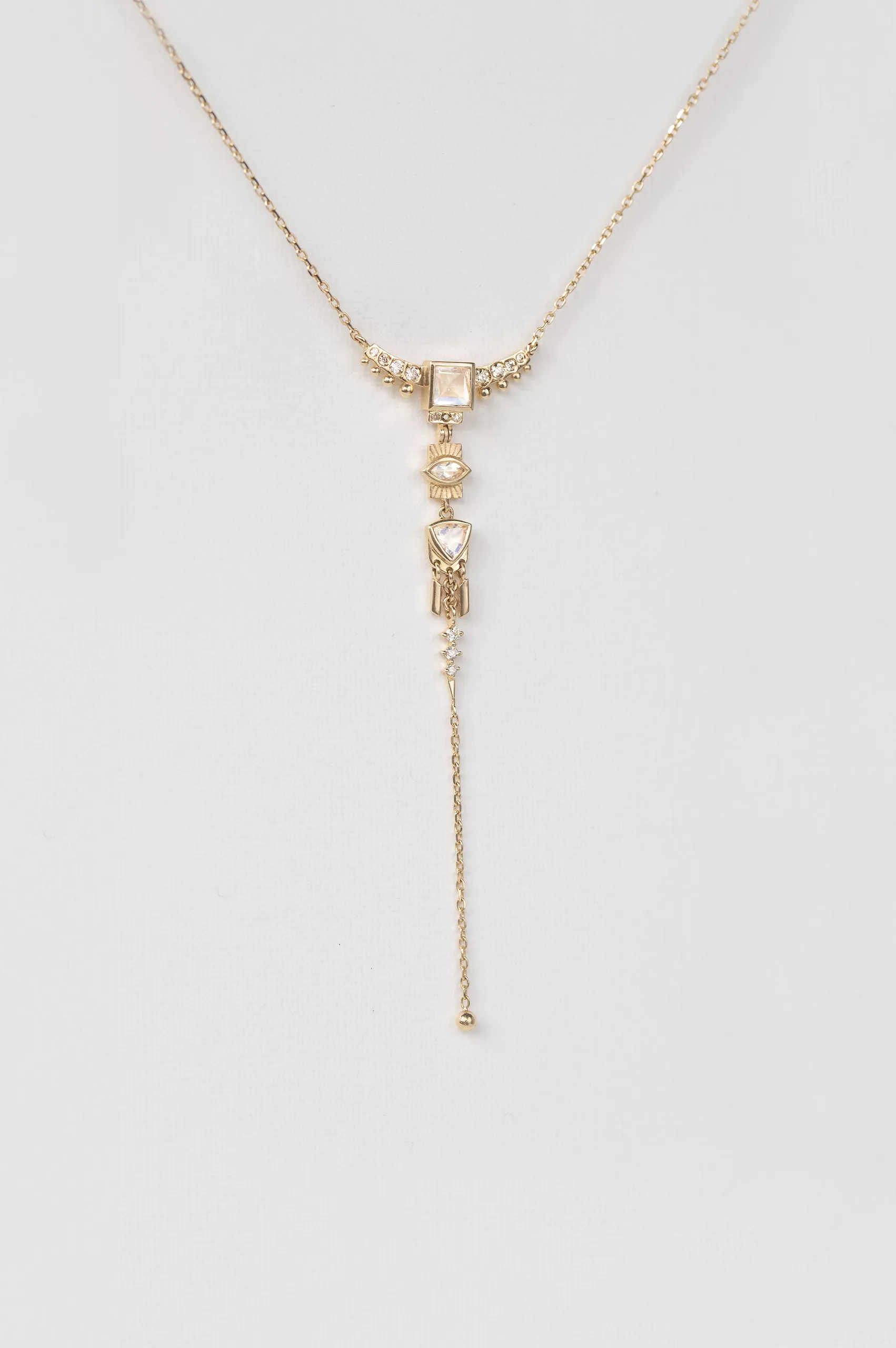 Yellow gold lariat necklace diamond totem charms moonstone drop chain Celine Daoust