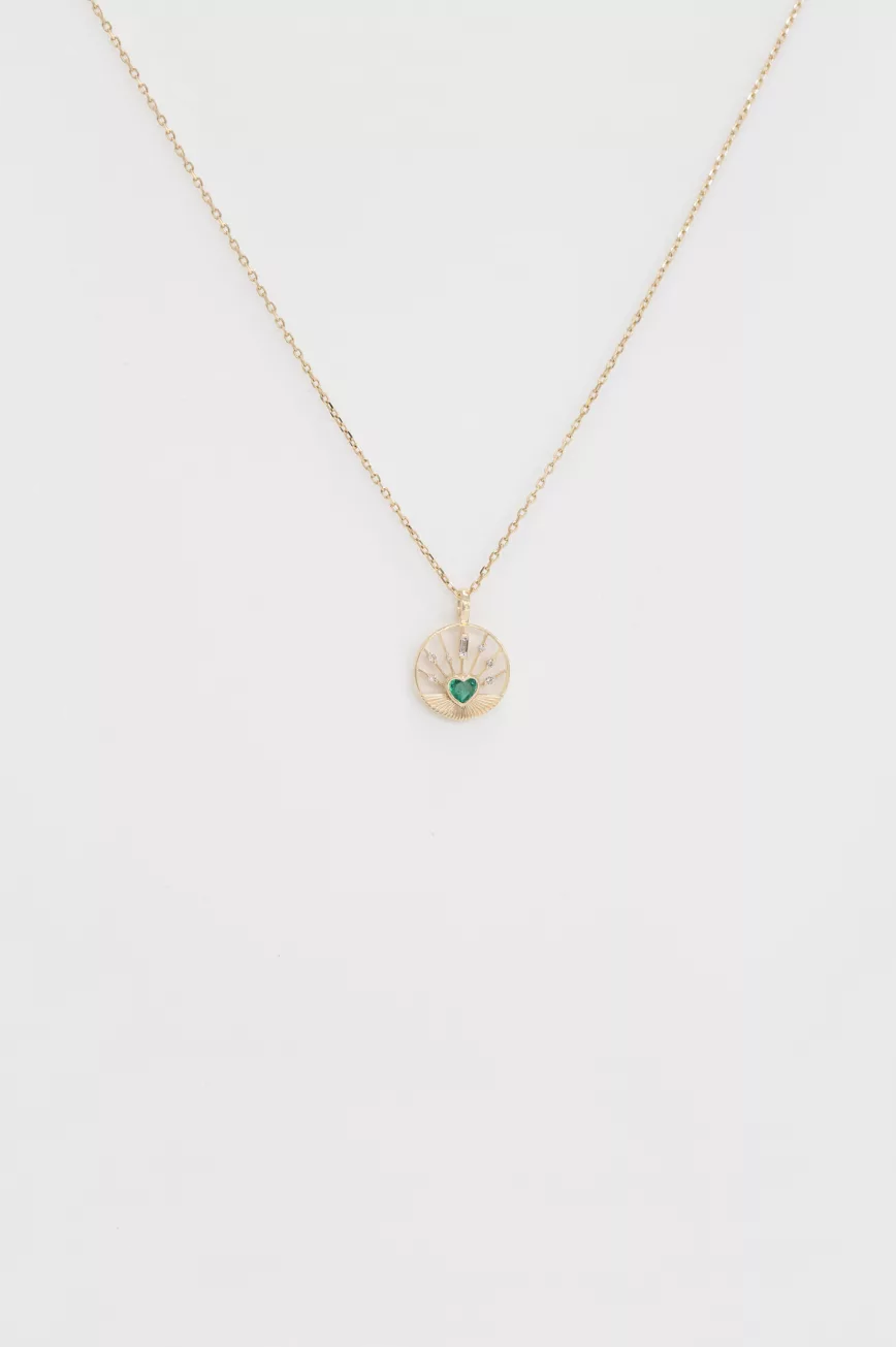 Gold necklace round open pendant heart-cut emerald center Céline Daoust