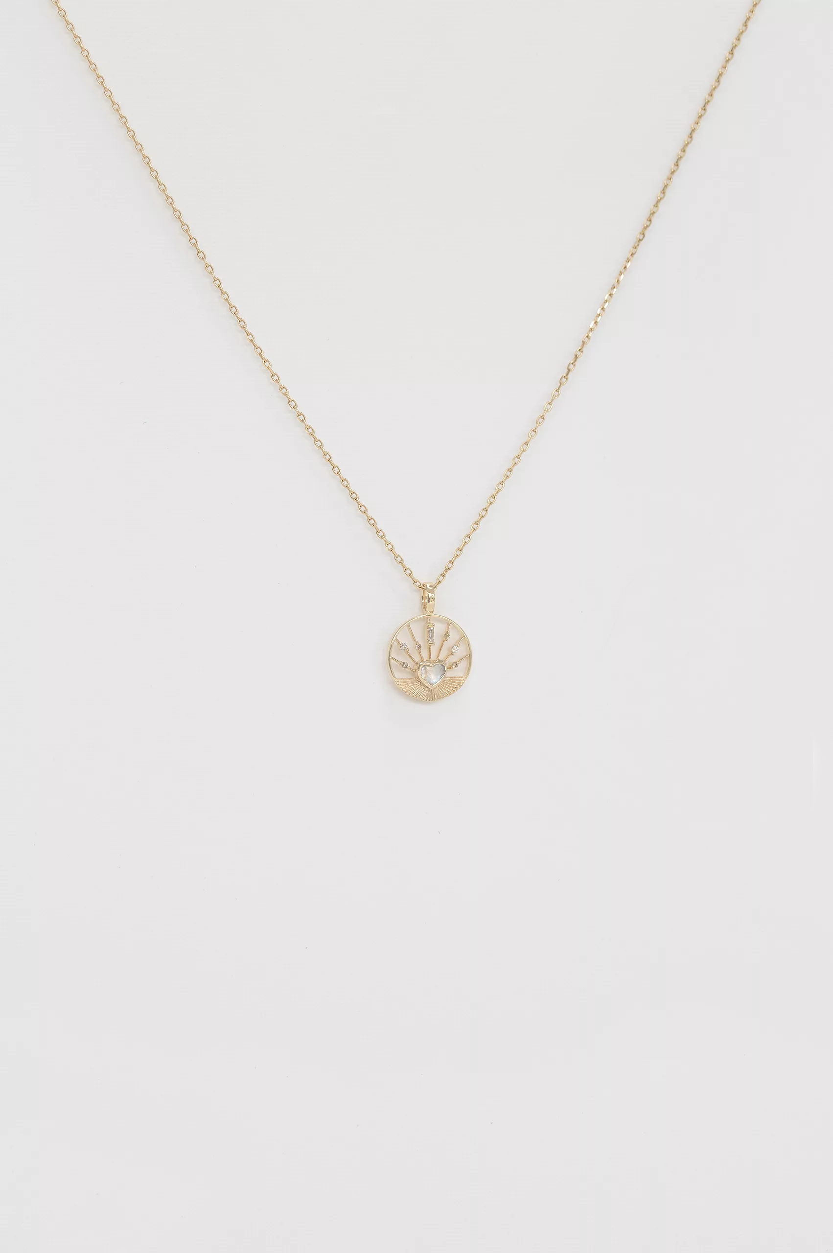 Yellow gold necklace round medal pendant moonstone heart motif delicate chain Celine Daoust