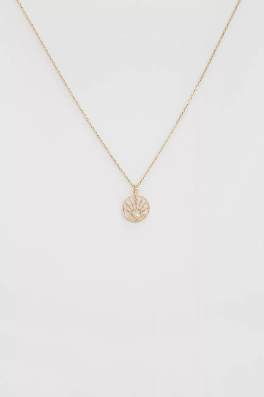 Yellow gold necklace round medal pendant moonstone heart motif delicate chain Celine Daoust