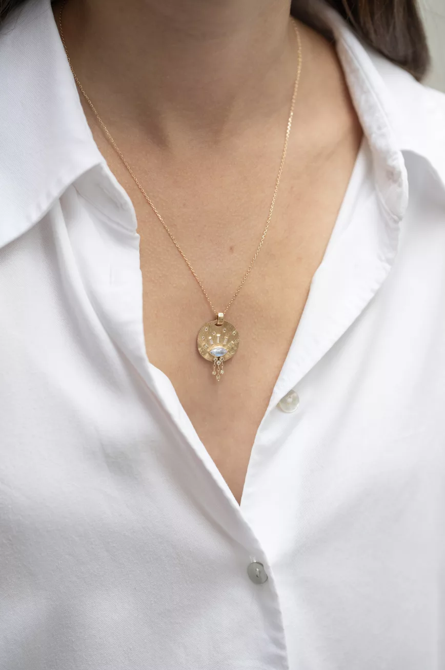Gold medal necklace moonstone cabochon baguette diamonds sun motif Céline Daoust