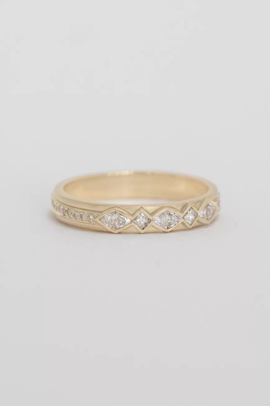 Yellow gold band ring multiple trillion-cut diamonds geometric setting Celine Daoust