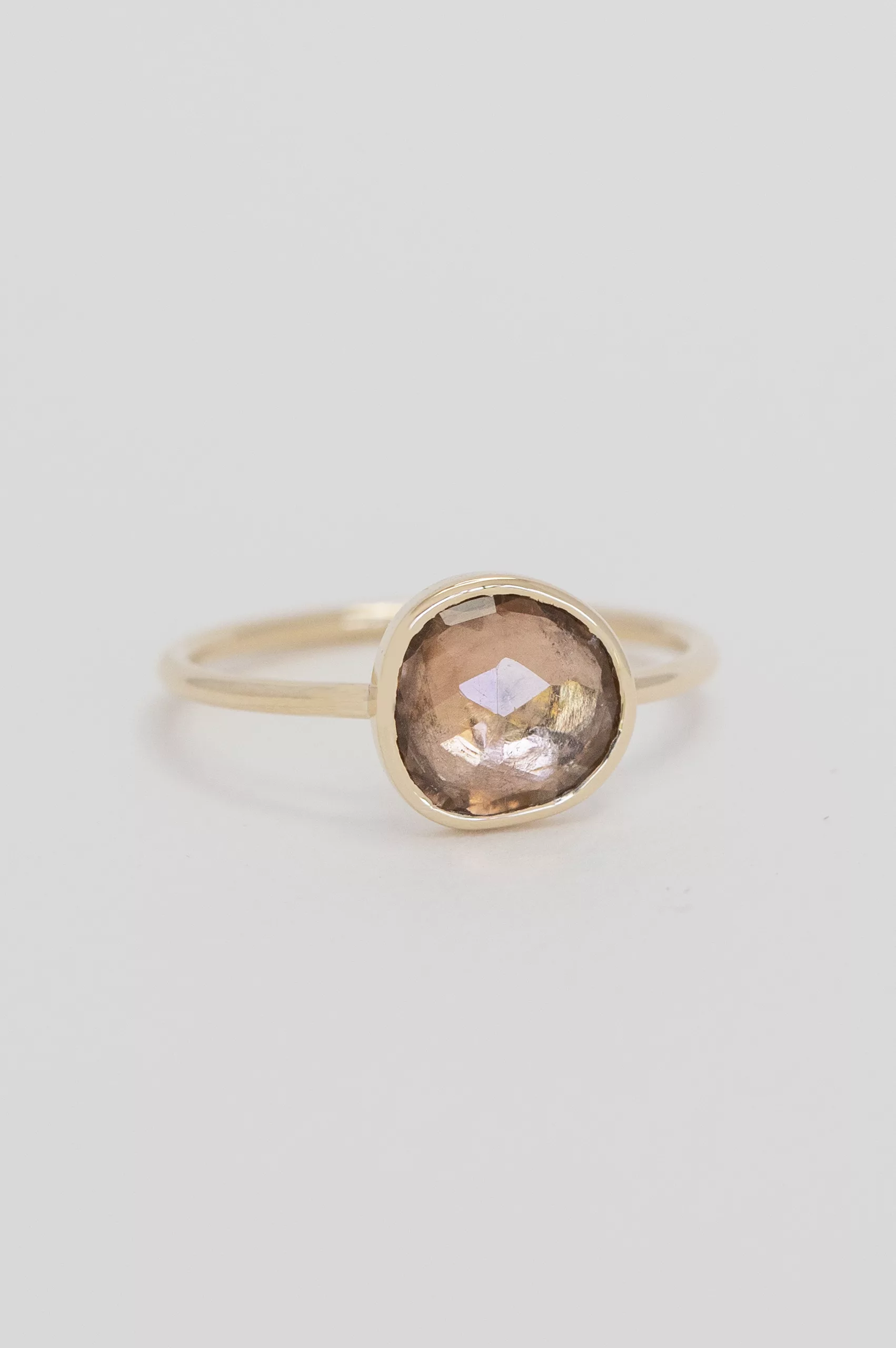 Yellow gold ring large round light pink tourmaline open bezel slim band Celine Daoust