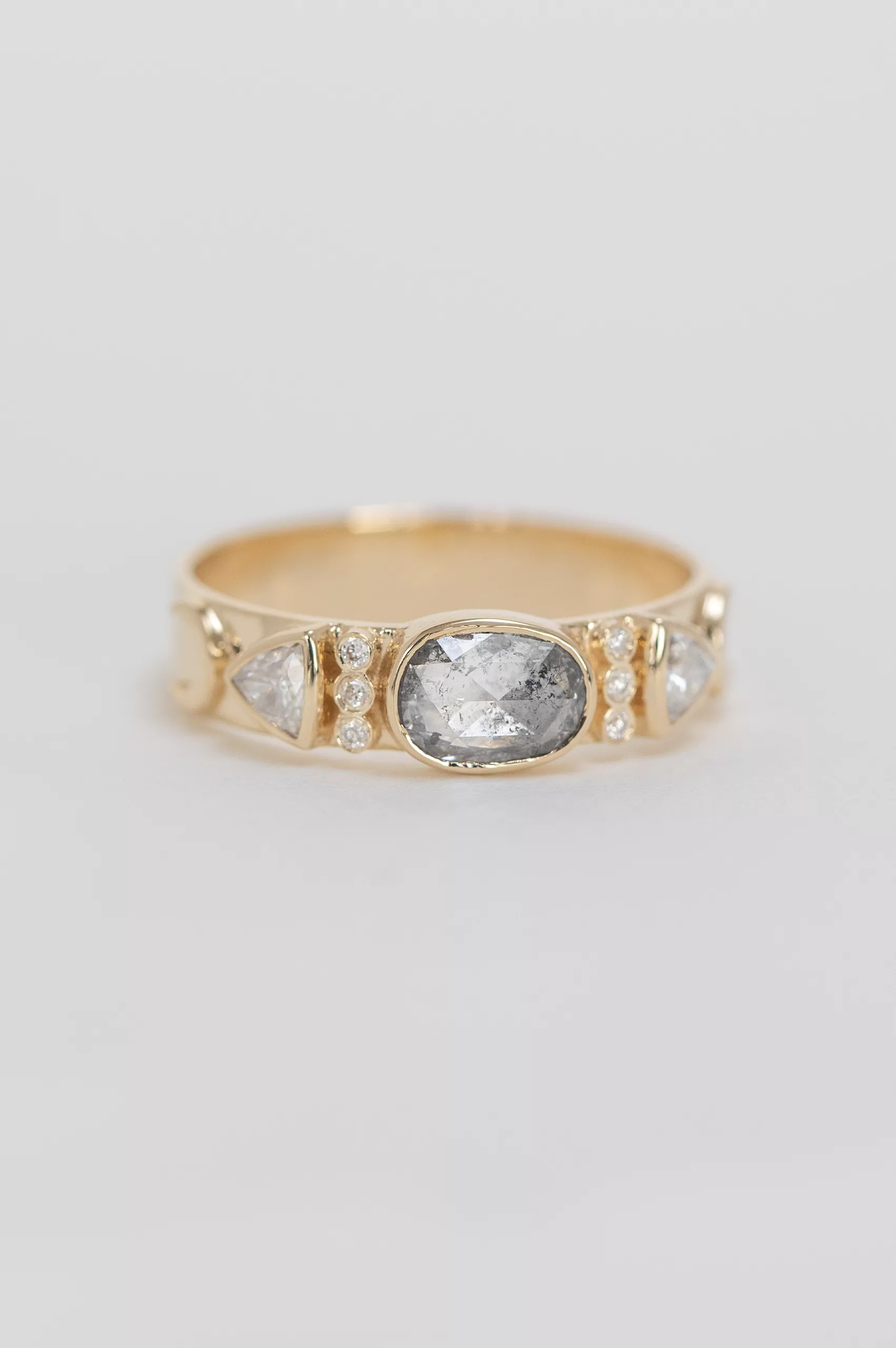 Yellow gold wide band ring oval grey diamond triangle diamond totem accents Celine Daoust