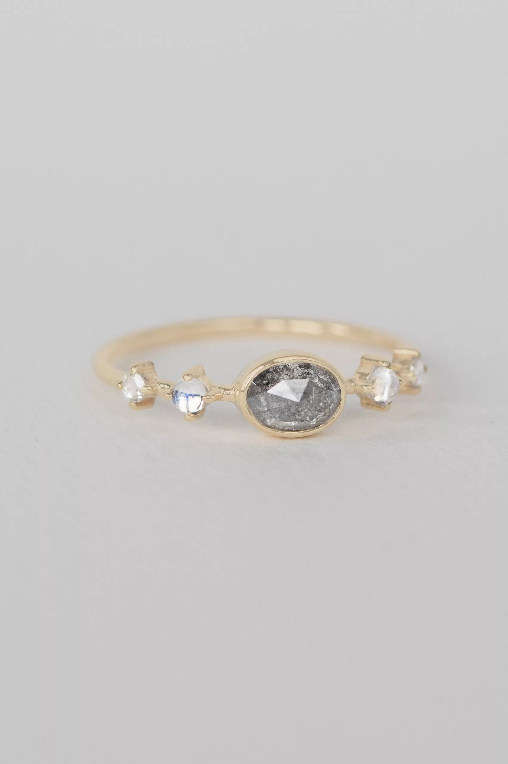 Yellow gold ring oval grey diamond moonstone marquise diamond accents Celine Daoust