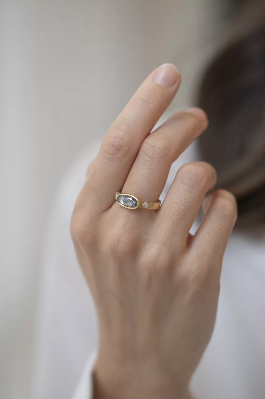 Yellow gold ring large oval grey diamond square diamond side accents Celine Daoust