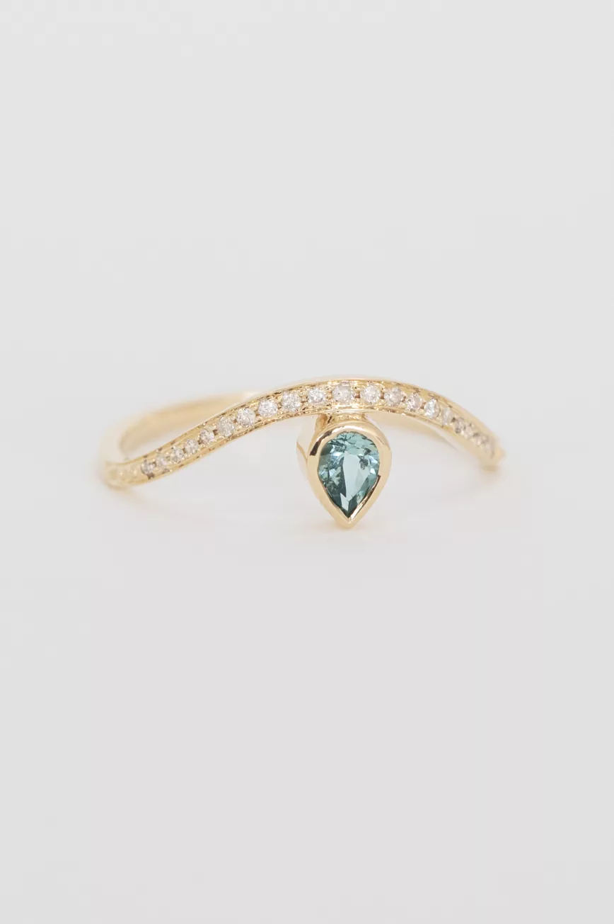 Gold wave ring pear blue tourmaline pavé diamond band Céline Daoust