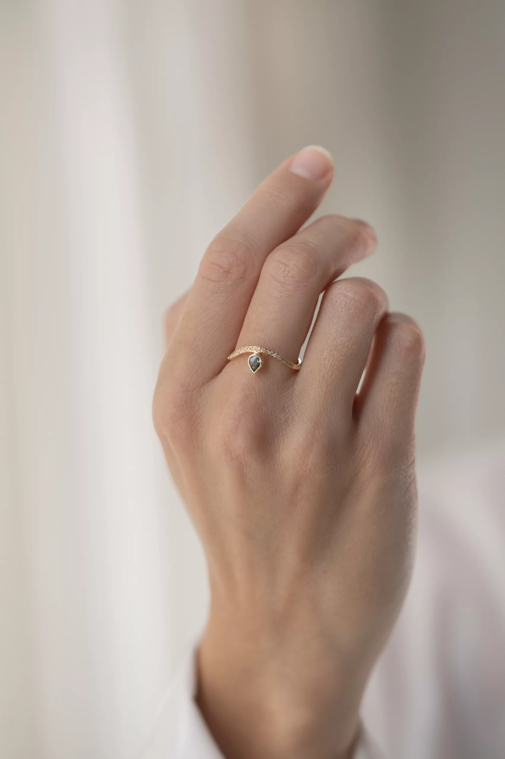 Gold wave ring pear blue tourmaline pavé diamond band Céline Daoust