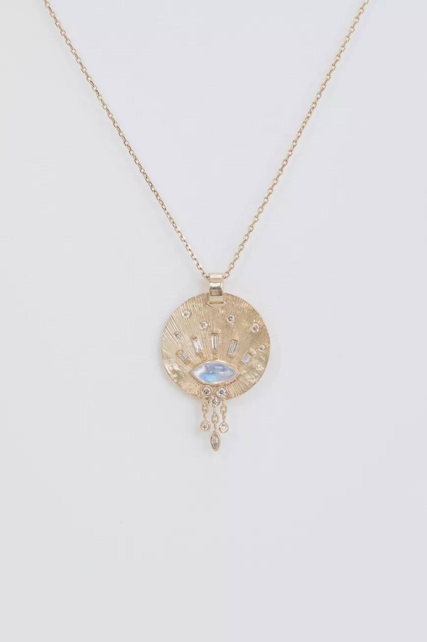 Gold medal necklace moonstone cabochon baguette diamonds sun motif Céline Daoust