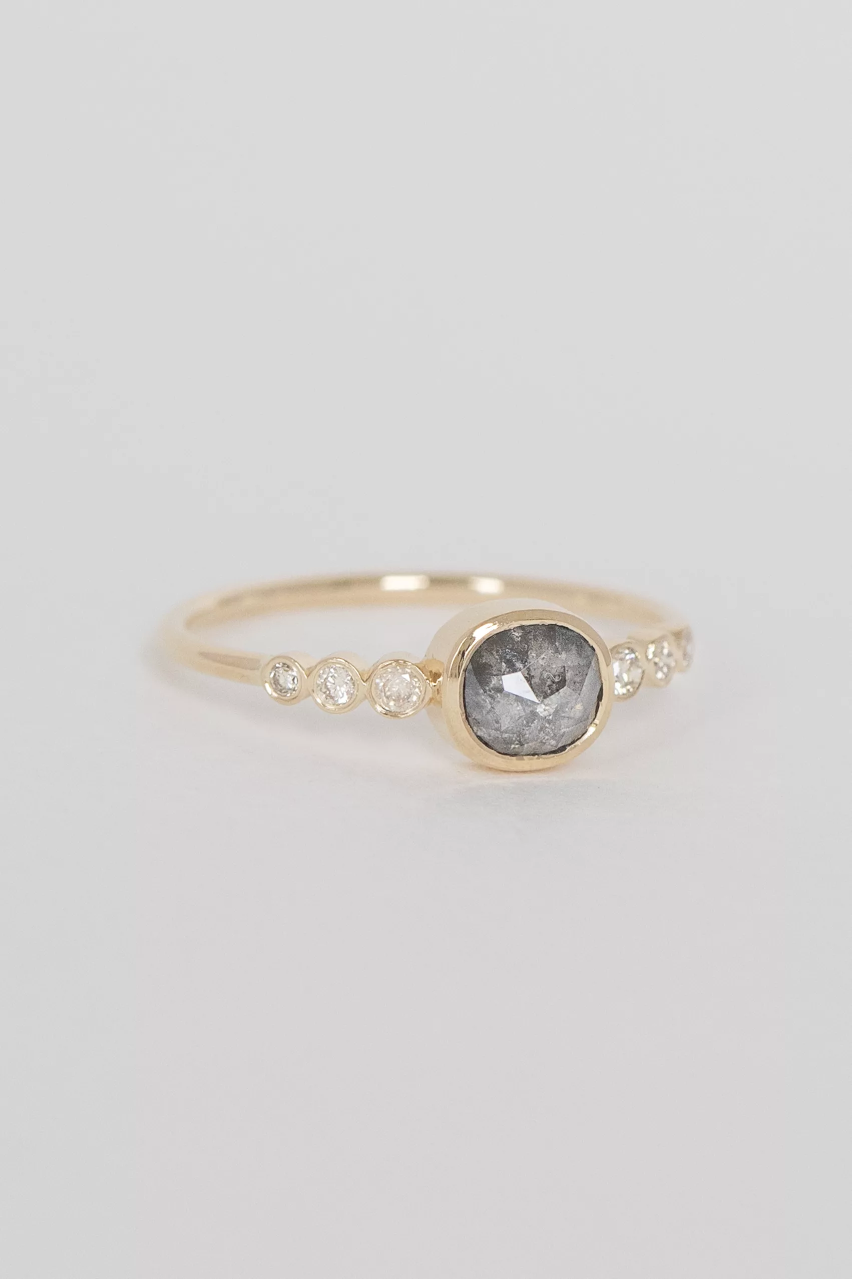 Yellow gold ring round grey diamond six bezel-set diamond accents Celine Daoust