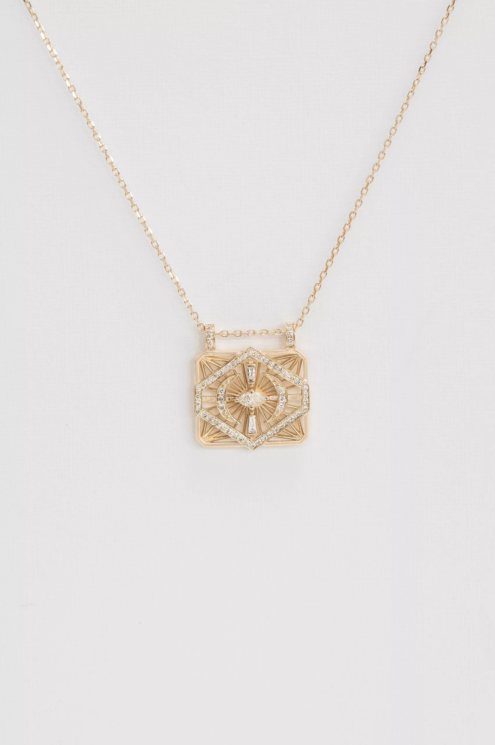 Gold necklace open rectangle pendant diamond losange moon motifs Celine Daoust