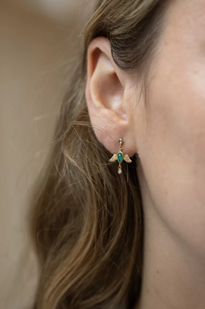 Yellow gold single drop earring sculpted bird motif pear emerald diamond accent Celine Daoust