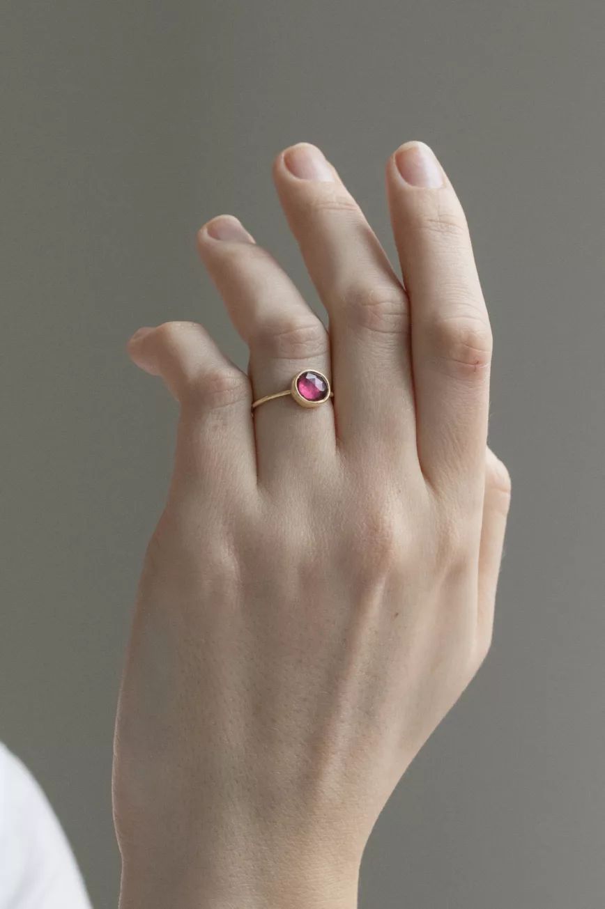 Yellow gold ring large oval pink tourmaline open bezel slim band Celine Daoust